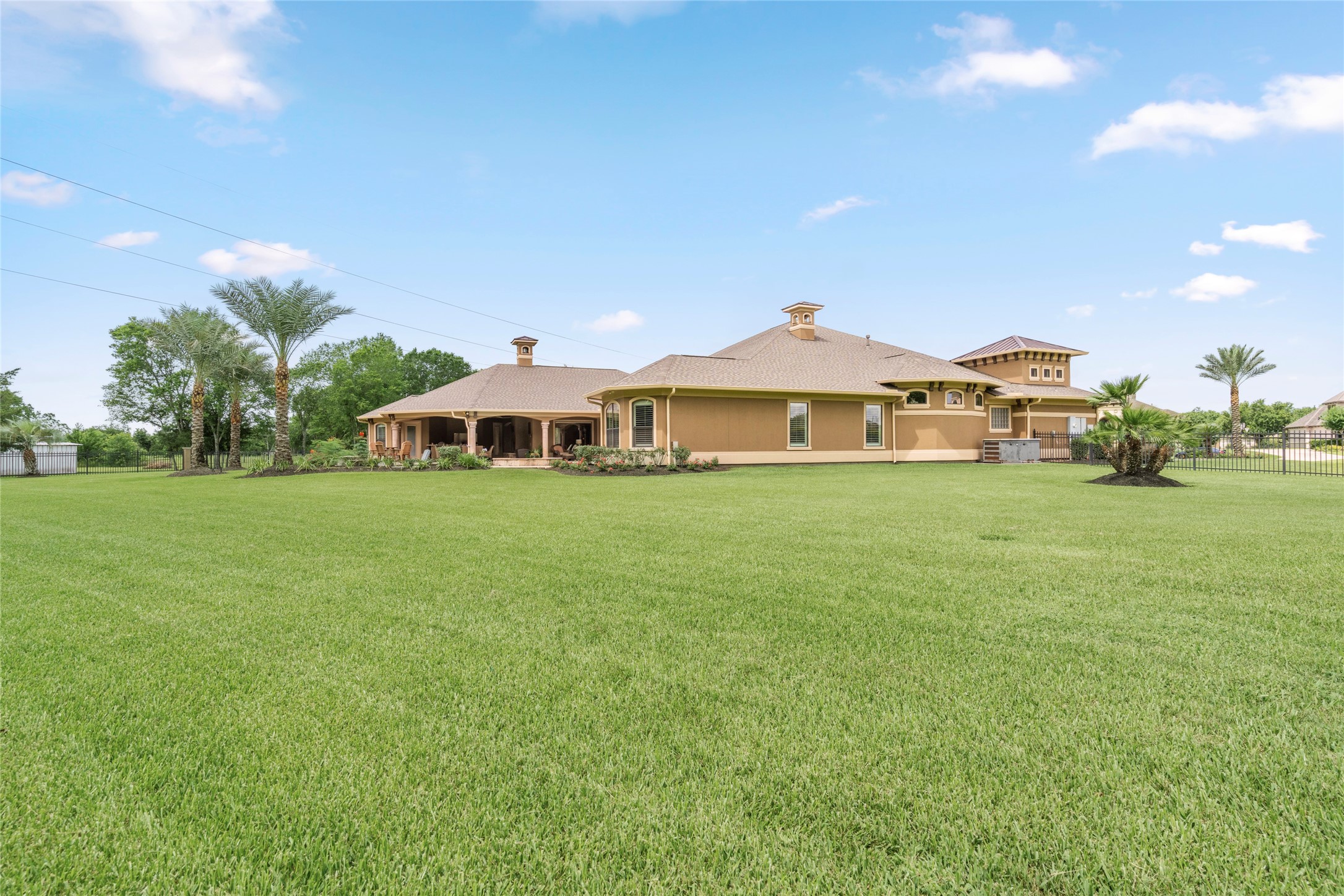 Expansive green space on this one-acre property. This estate truly has it all! The home has a generator for those times when the power goes out.