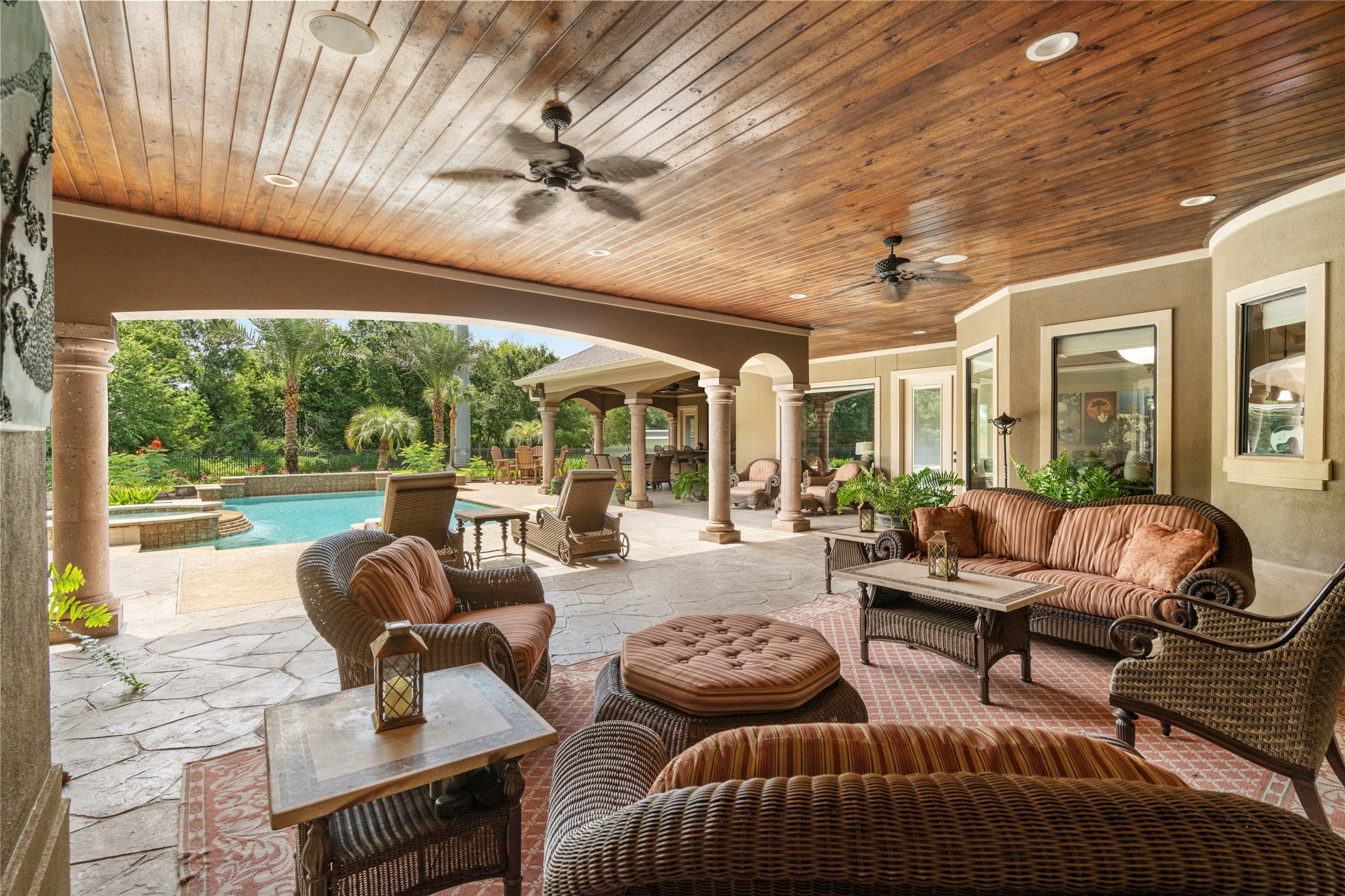 Relax effortlessly in this outdoor oasis with ample covered areas, pool and spa views, and plenty of room for family and friends to gather and enjoy the fresh air.