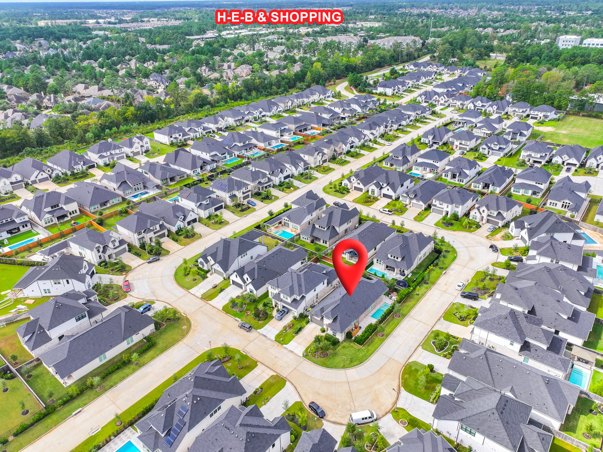 Aerial view locating the home within its established Spring neighborhood, just minutes from The Woodlands with quick access to the Grand Parkway, everyday shopping, dining and area parks.