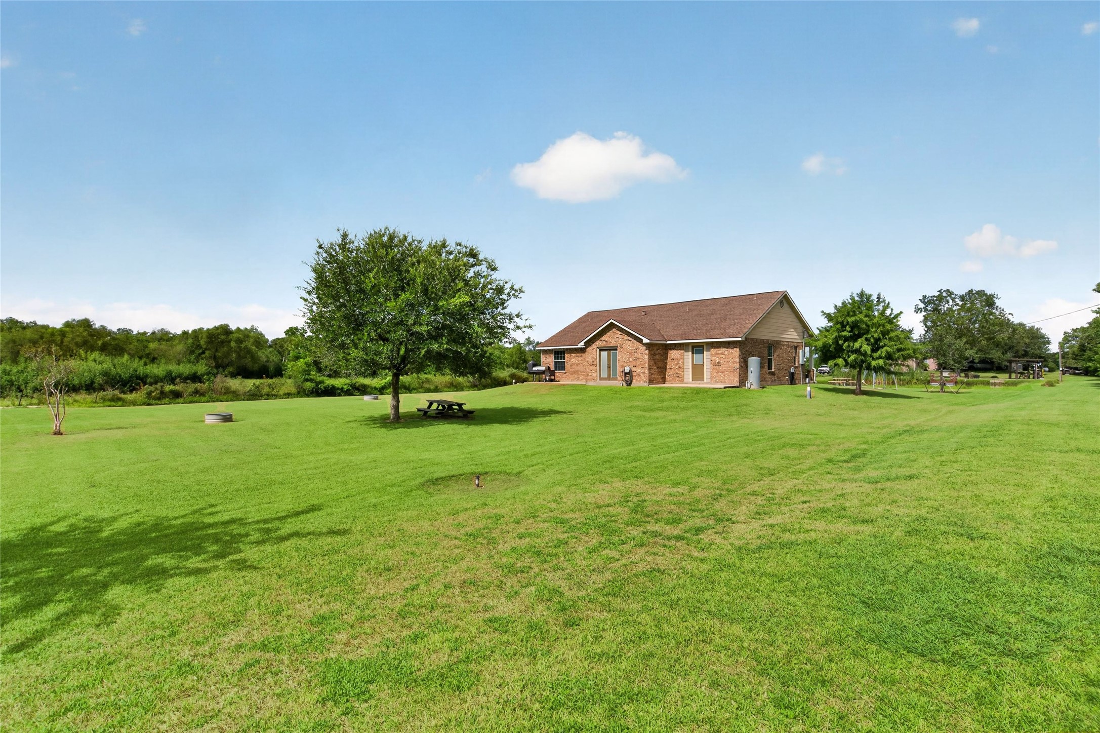 Enjoy two separate back patios with direct access from the kitchen and the primary bedroom