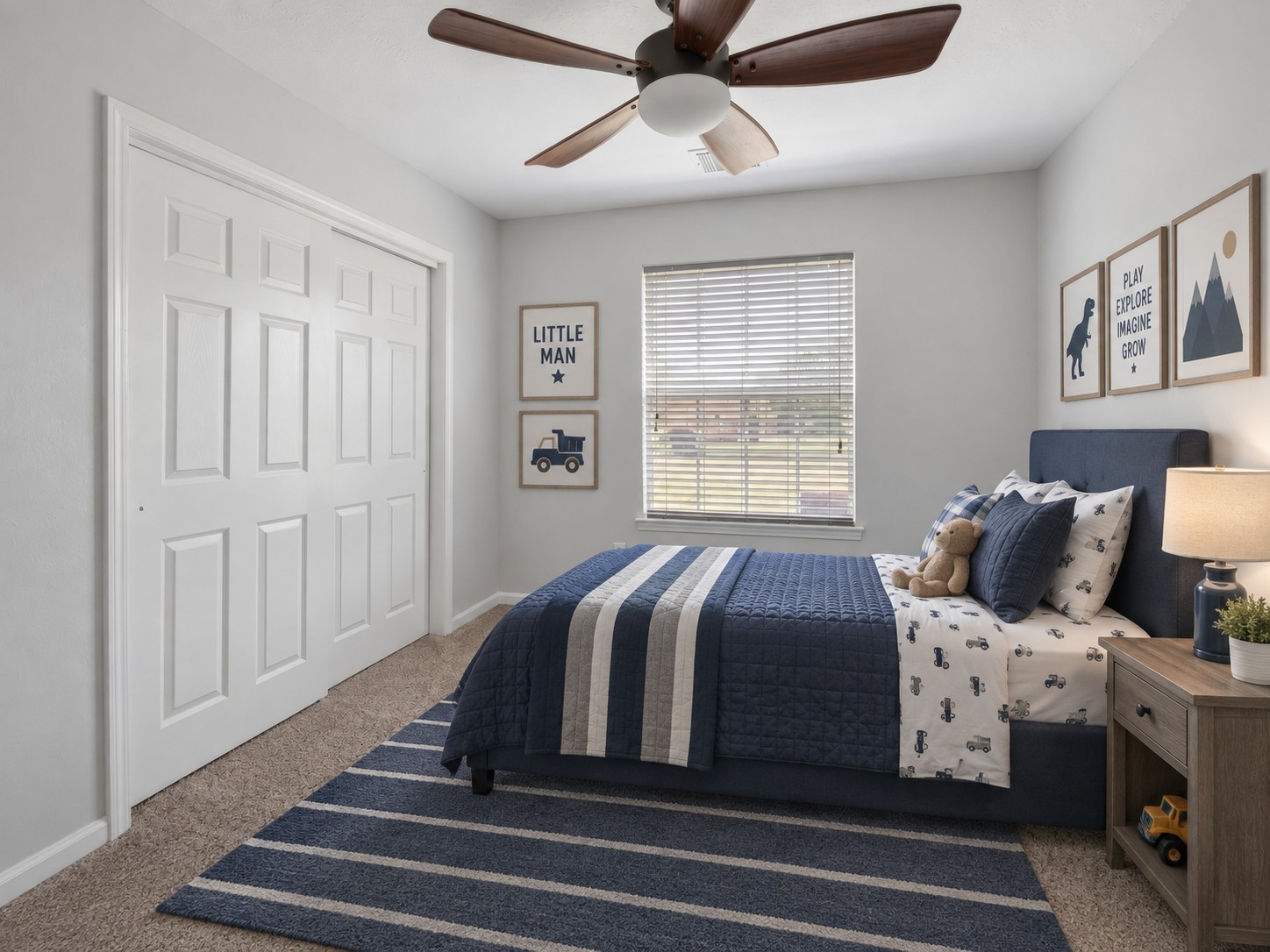 Third bedroom (virtually staged) with an upgraded ceiling fan and views of the backyard.