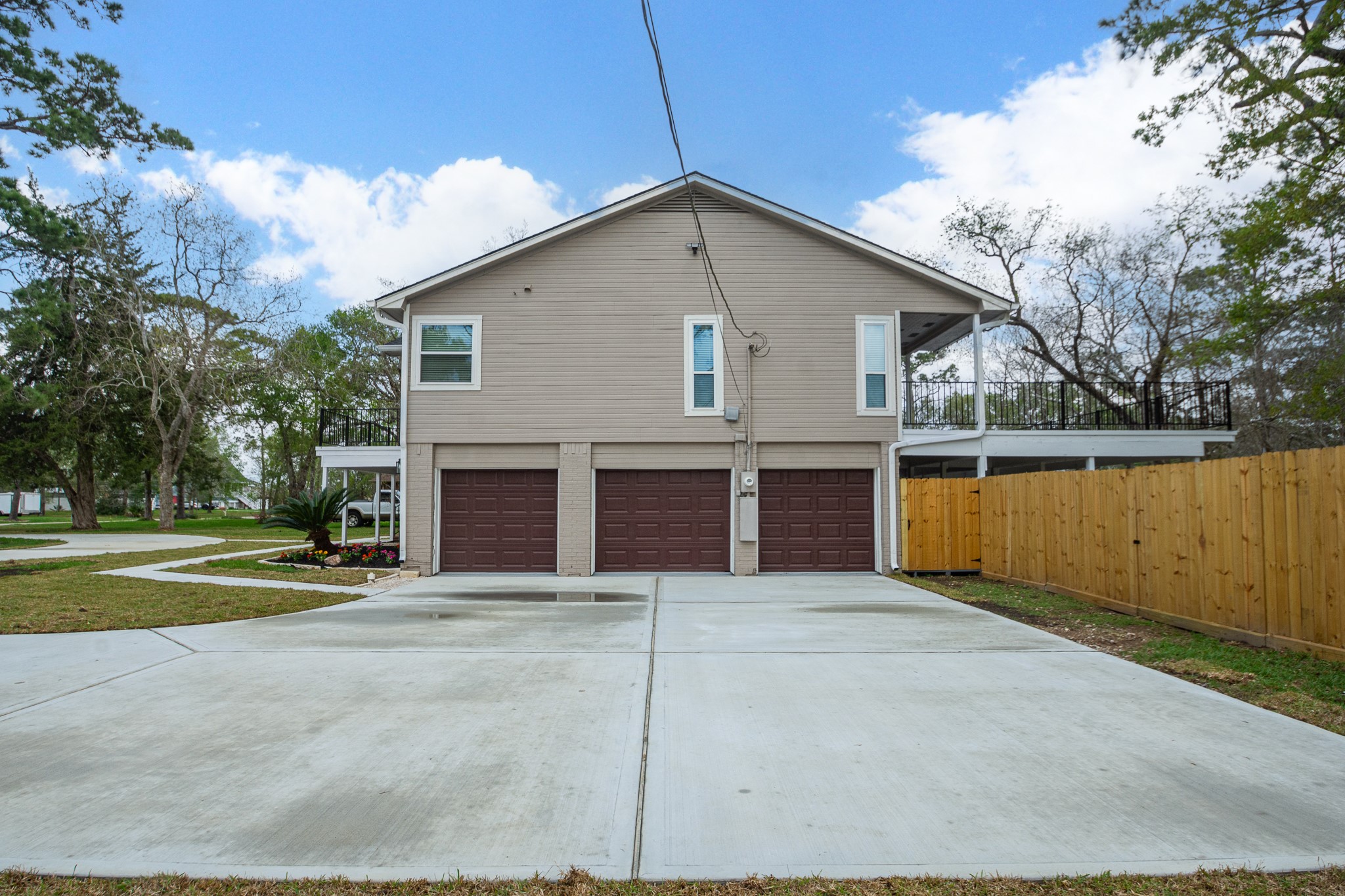 3 car garage with extra wide driveway.