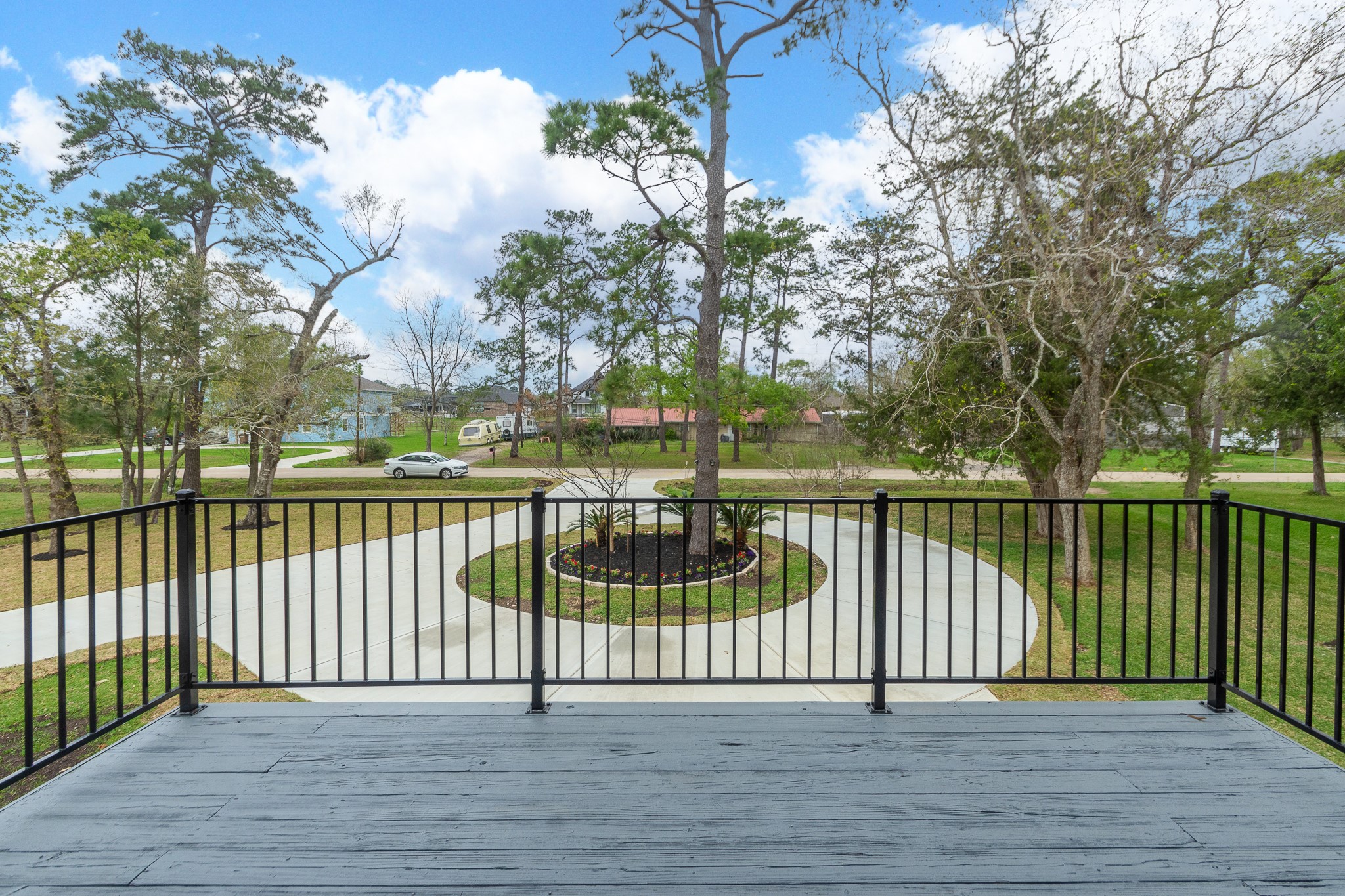 Right off the kitchen, you can step out onto a spacious 2nd-story deck with new railing.