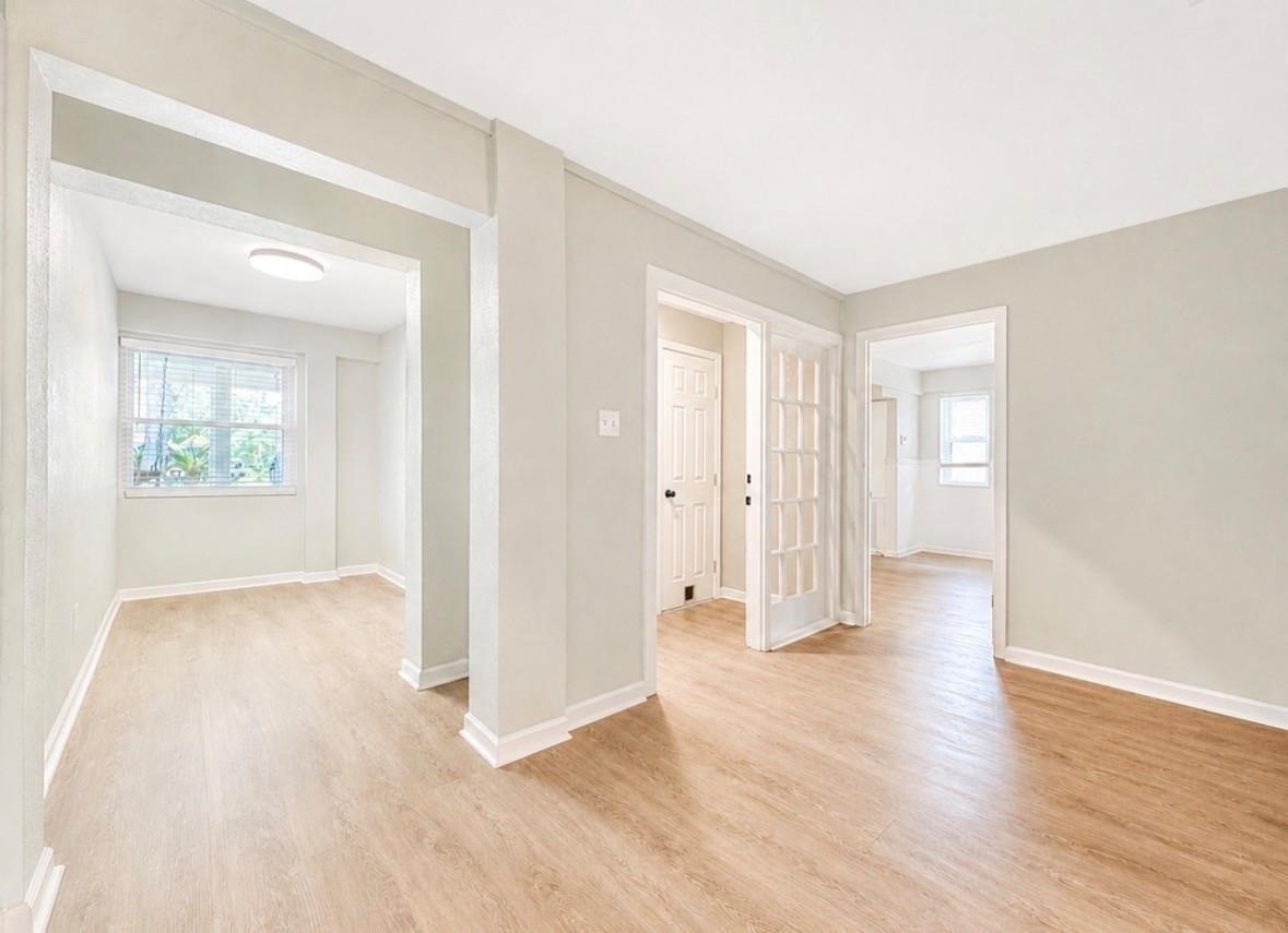 Downstairs area with an open workspace, craft room or additional storage. One thing this home does not lack is storage space.