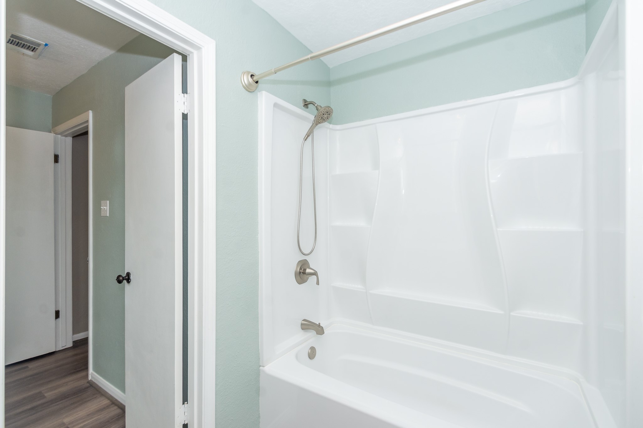 Tub/shower combo in upstairs bathroom.