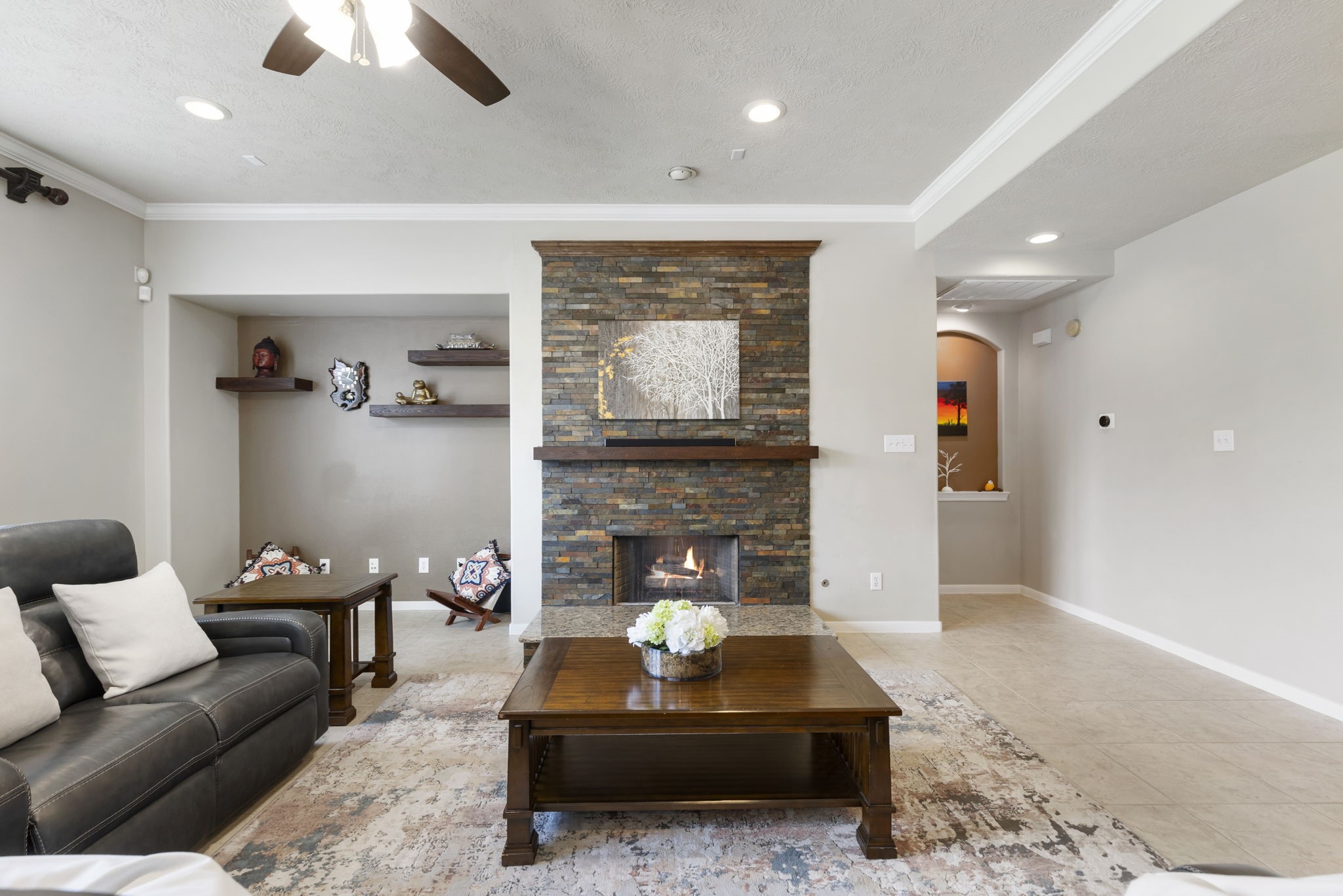A bright and spacious living area provides the perfect place to relax, complete with timeless details and room for everyone to feel at home.