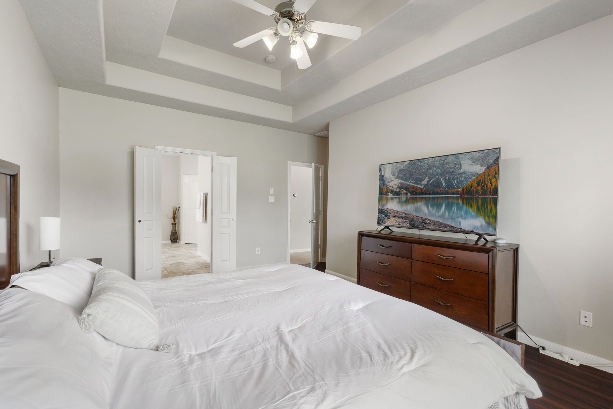 Spacious and inviting, the primary bedroom provides plenty of room to relax and unwind with convenient access to the en-suite bathroom.