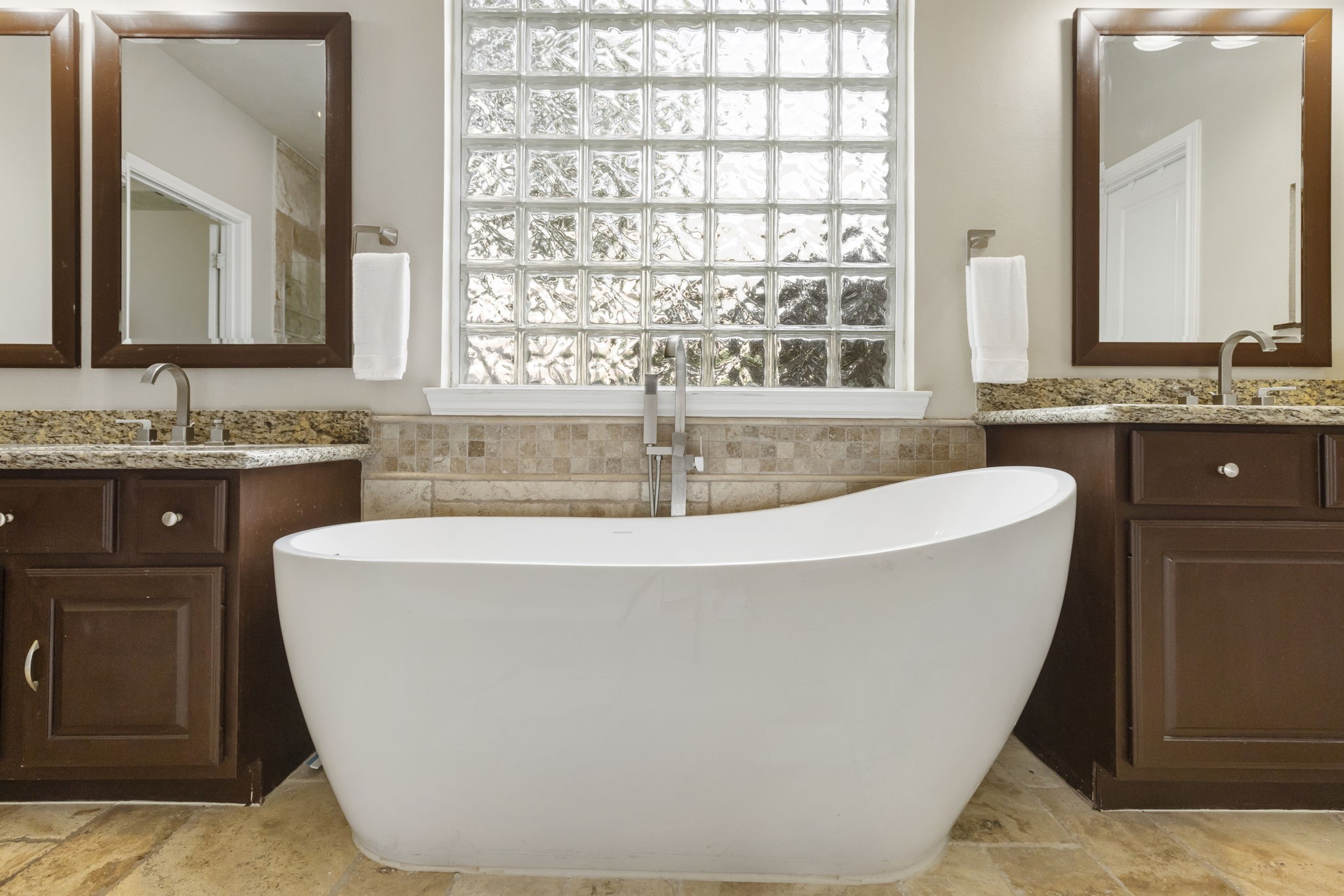 End your day in your own private retreat  a relaxing freestanding soaking tub creates the perfect place to unwind and recharge.