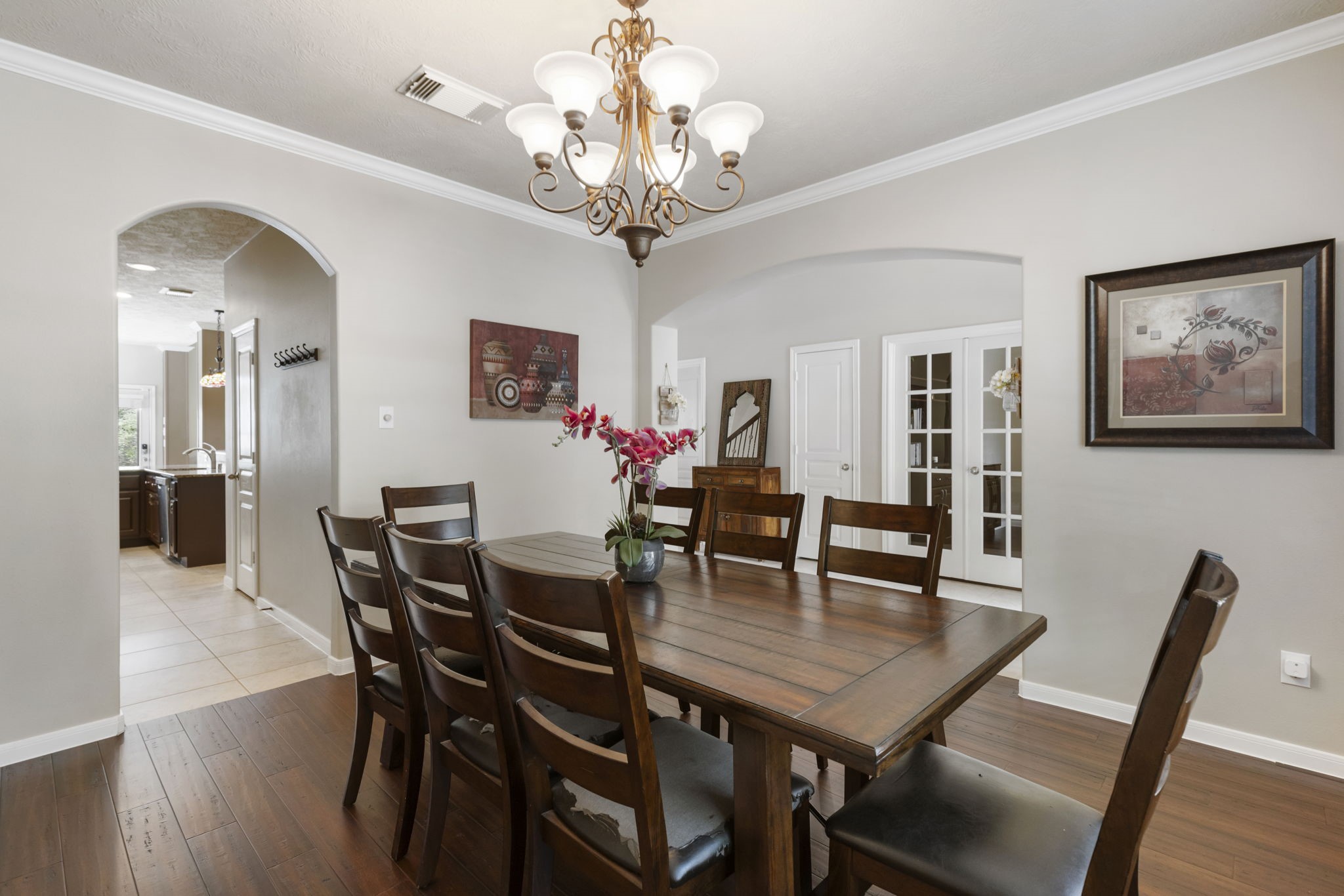 Located just off the entryway, the formal dining room offers an inviting space to host family dinners, holidays, and special gatherings.