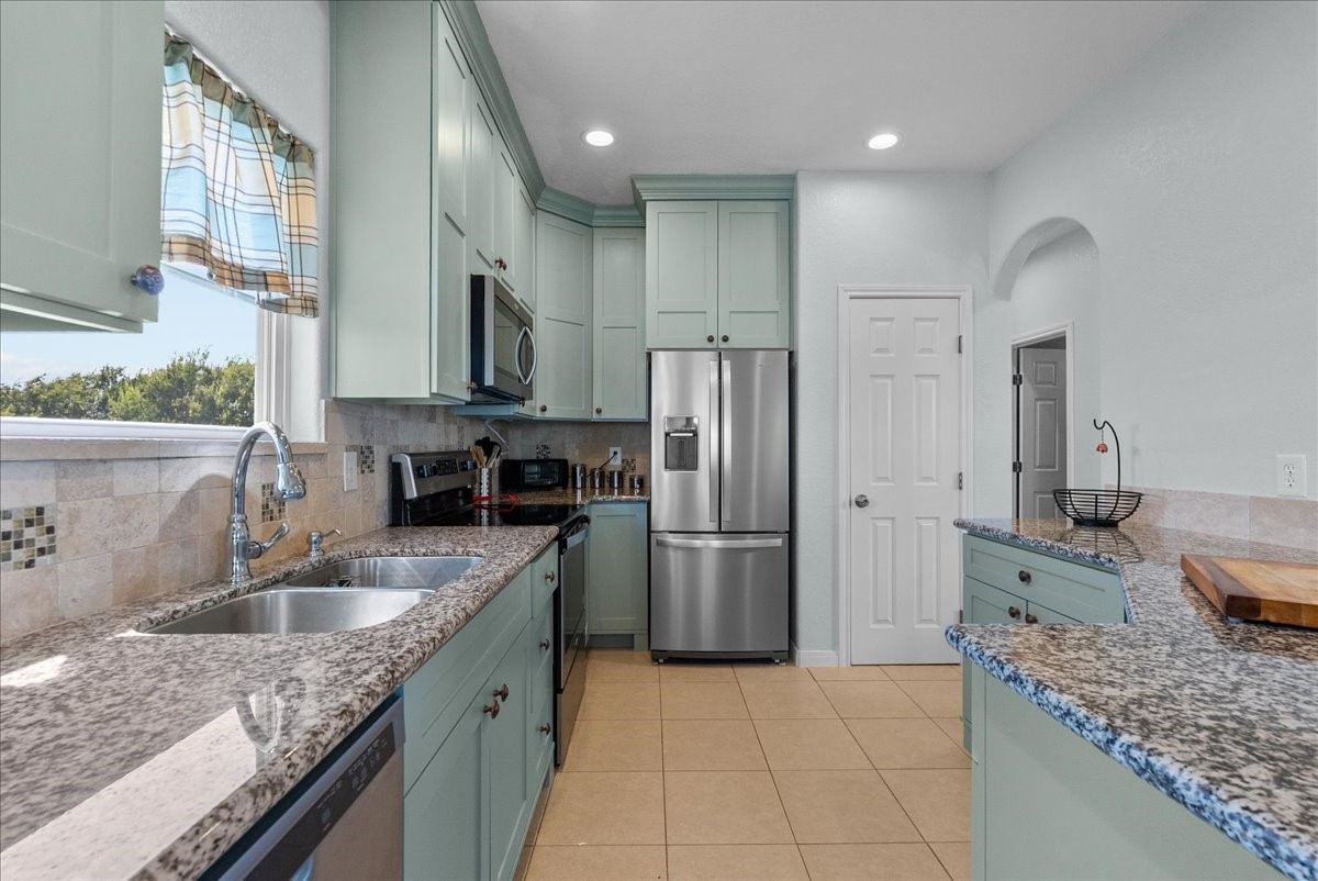 Kitchen has granite countertops