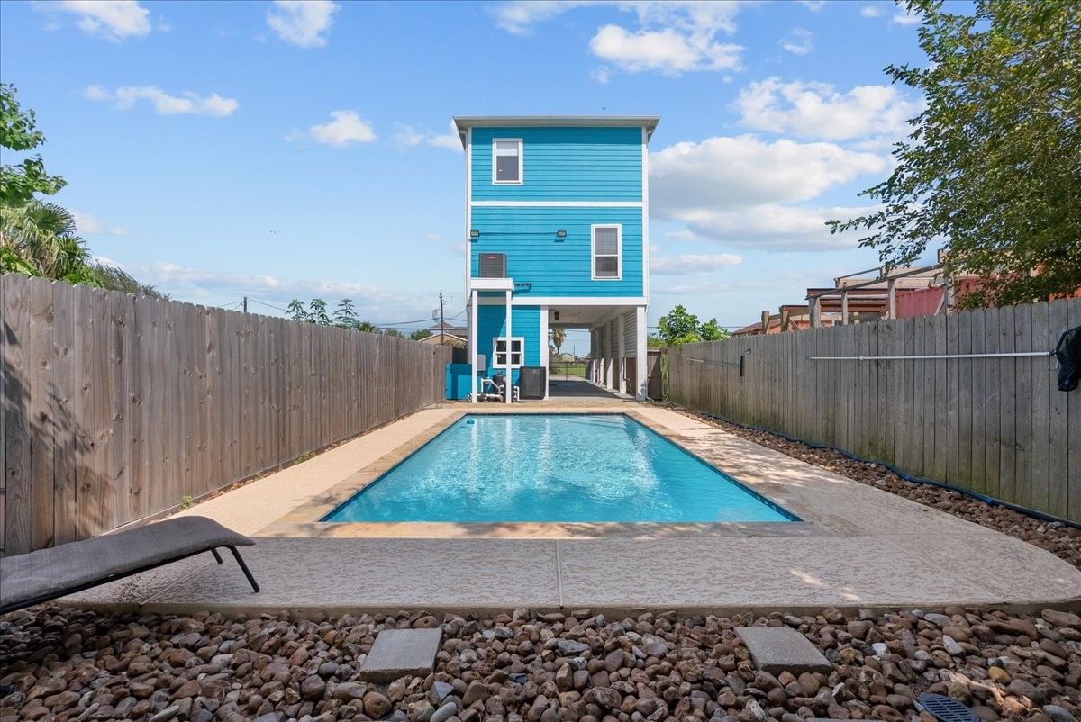 Climate-controlled pool in fully fenced yard Climate-controlled pool in fully fenced yard
