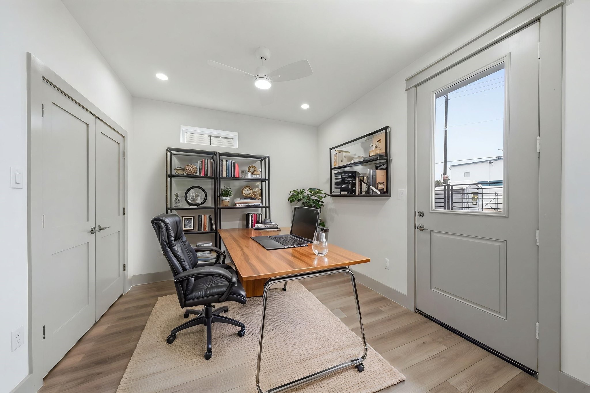 Virtually staged - Guest bedroom on the 1st floor w door/access to yard! Double door closet on the left. Use this space as an office, workout space or another guest bedroom!