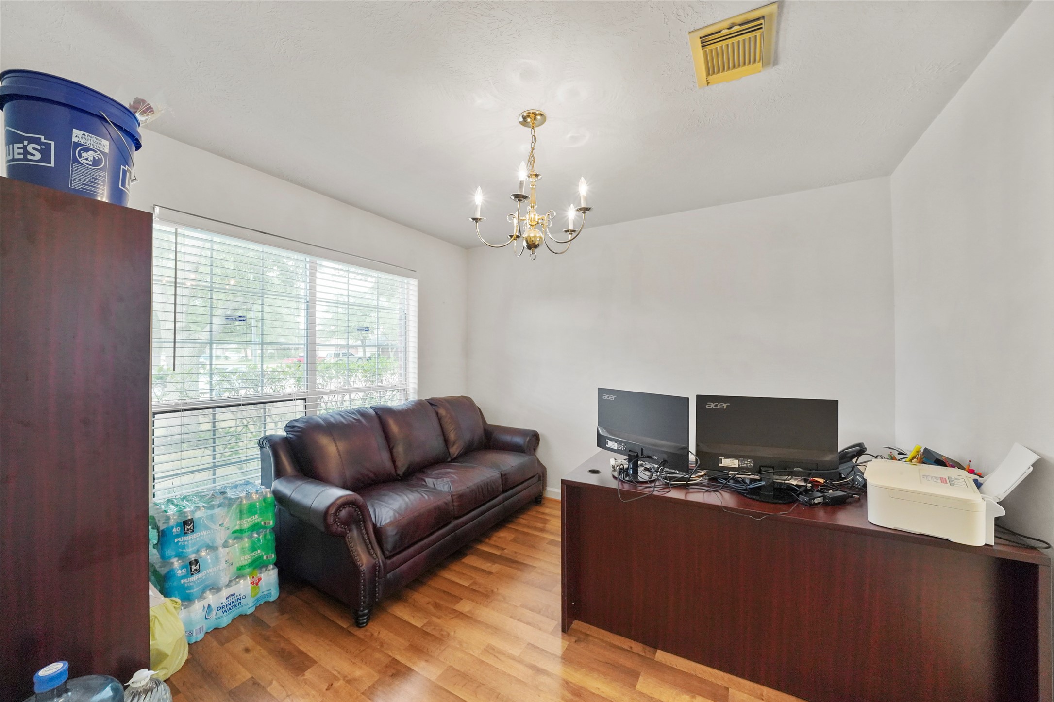The formal dining room is currently arranged as a home office, showing how easily this front room adapts to a private workspace, library, or setting for memorable dinners. The formal dining room is currently arranged as a home office, showing how easily this front room adapts to a private workspace, library, or setting for memorable dinners.