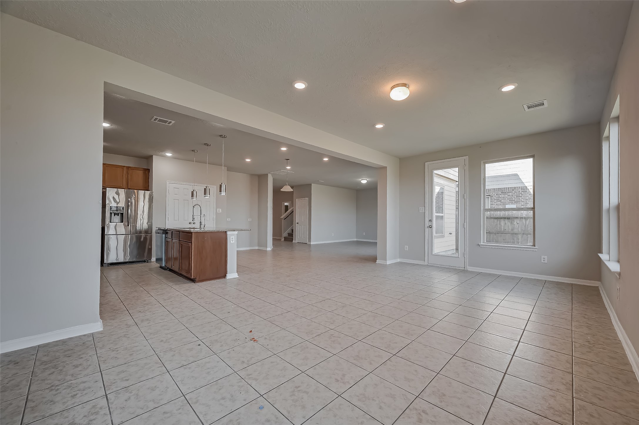 Family room featuring a doorway to the yard.