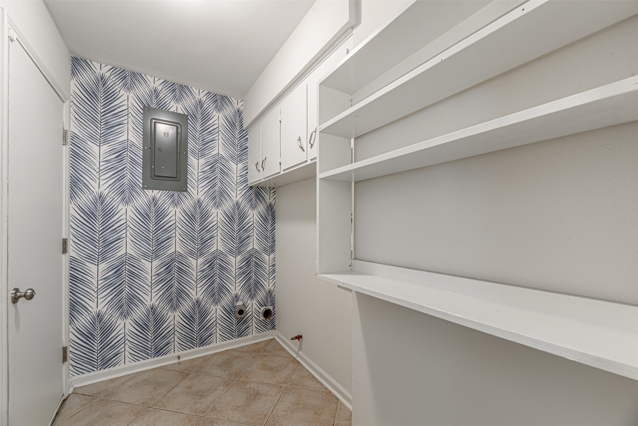 In the laundry room are the main switches of the house. That door gives you access to the backyard.