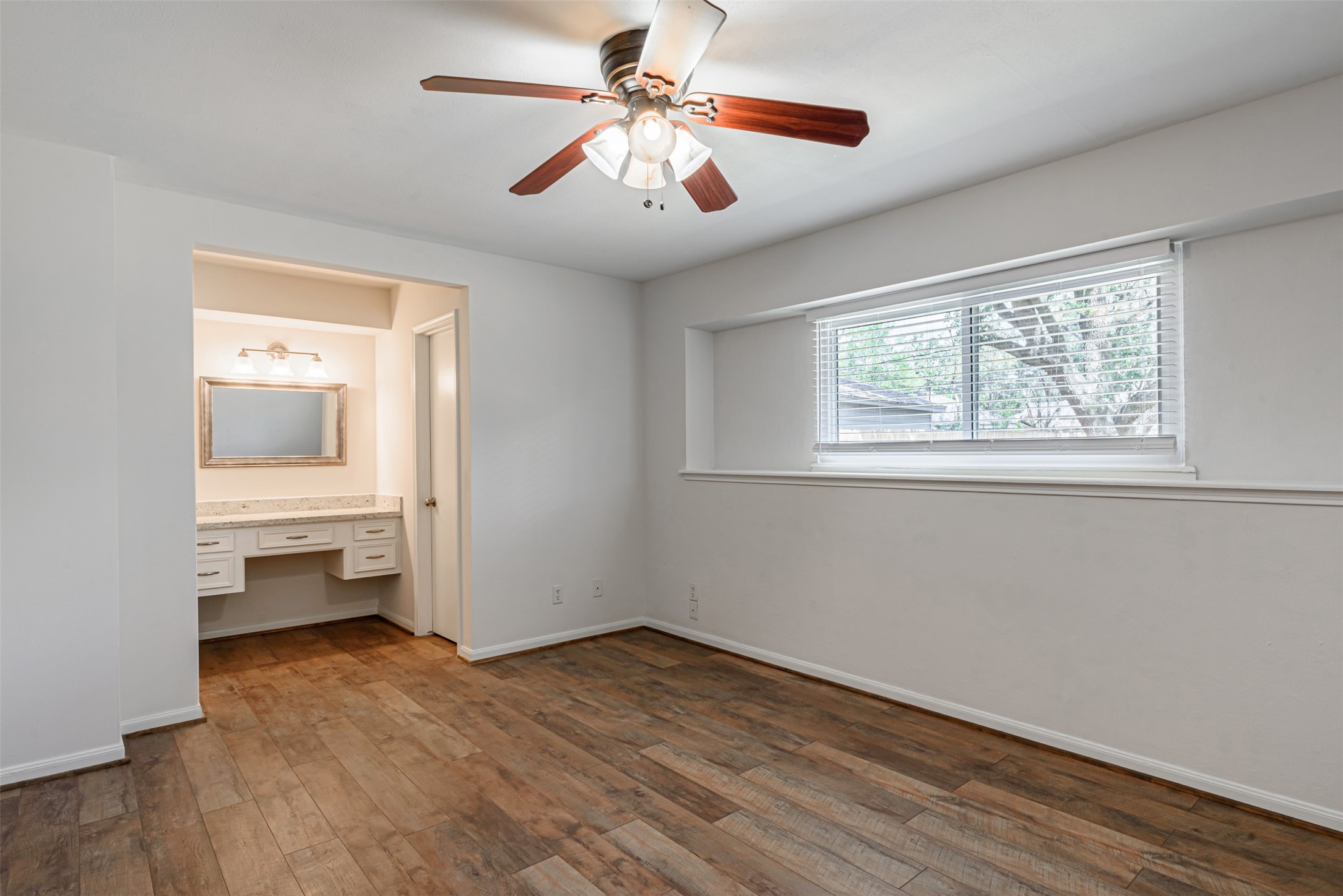 The Master Bedroom. This view shows the wide access door to the bathroom.