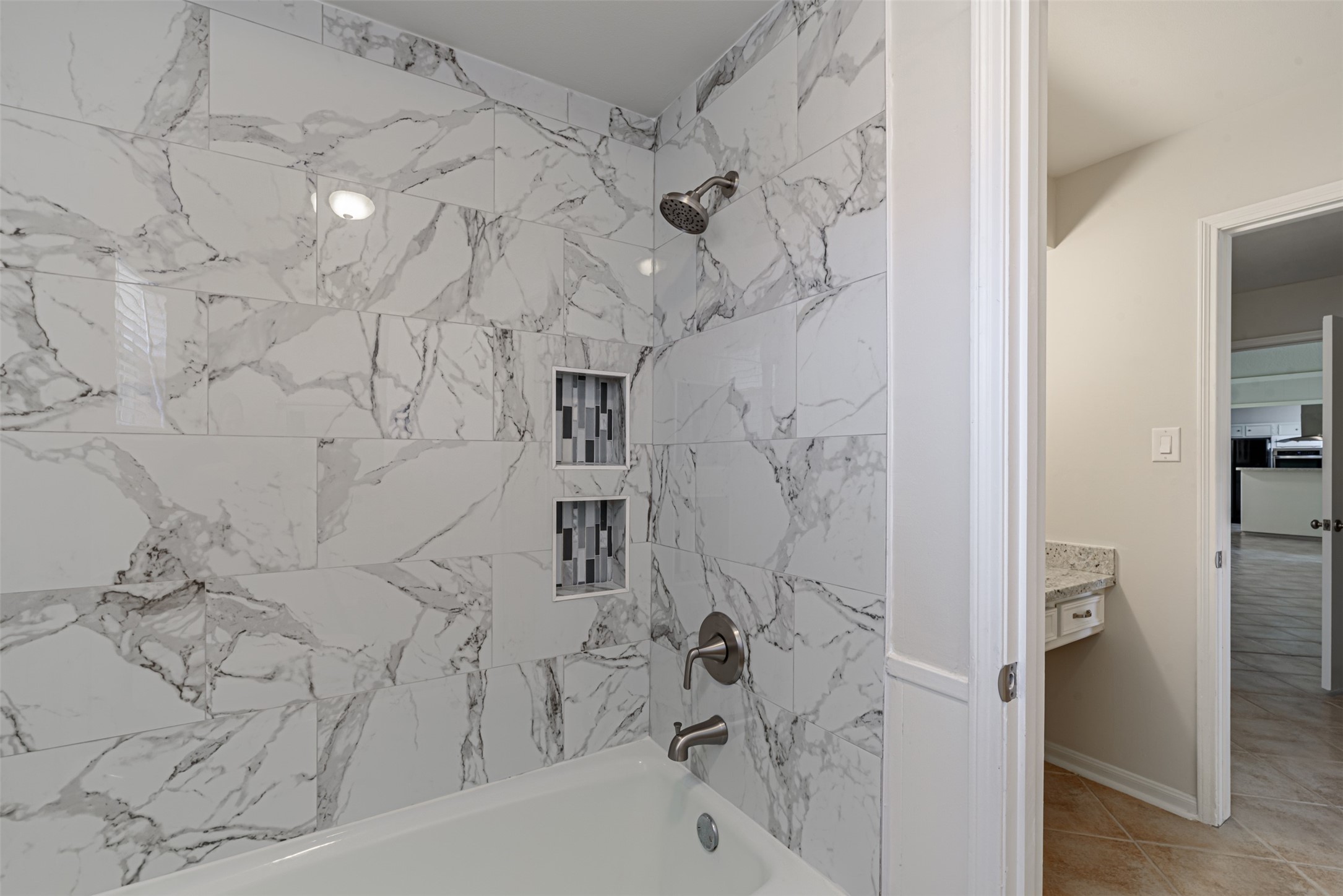 Another view of the beautiful remodeled bathroom.