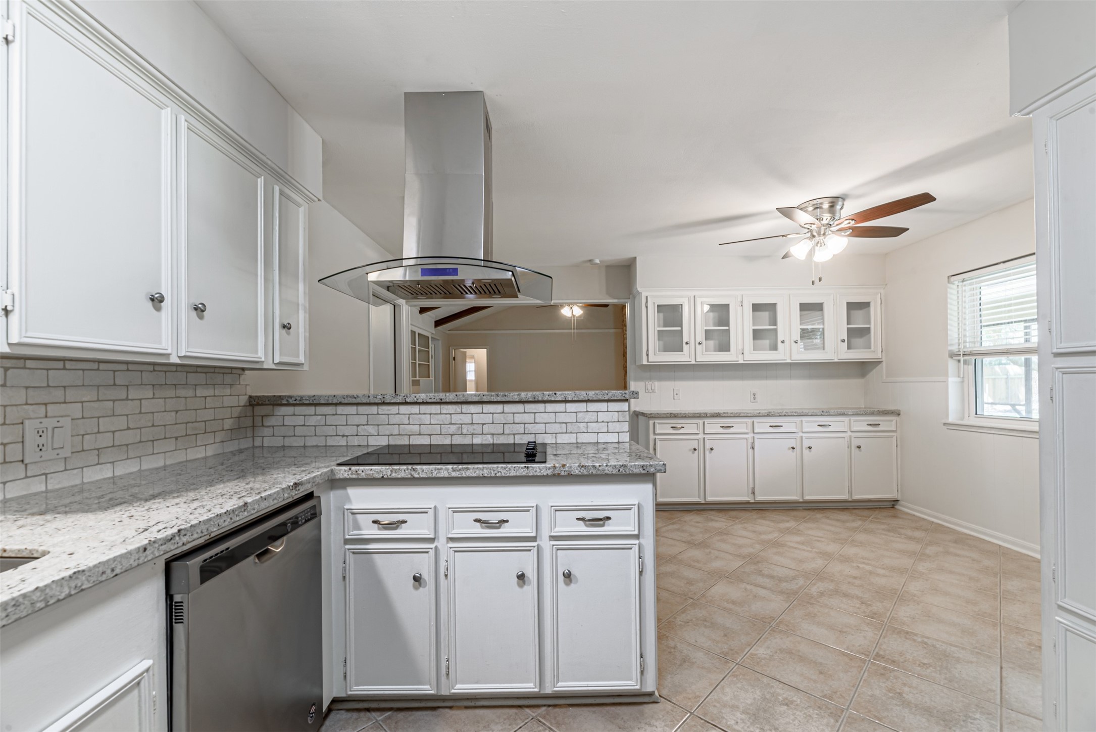 The open layout of this home incorporates the kitchen into the living room, giving you complete control when having gatherings.