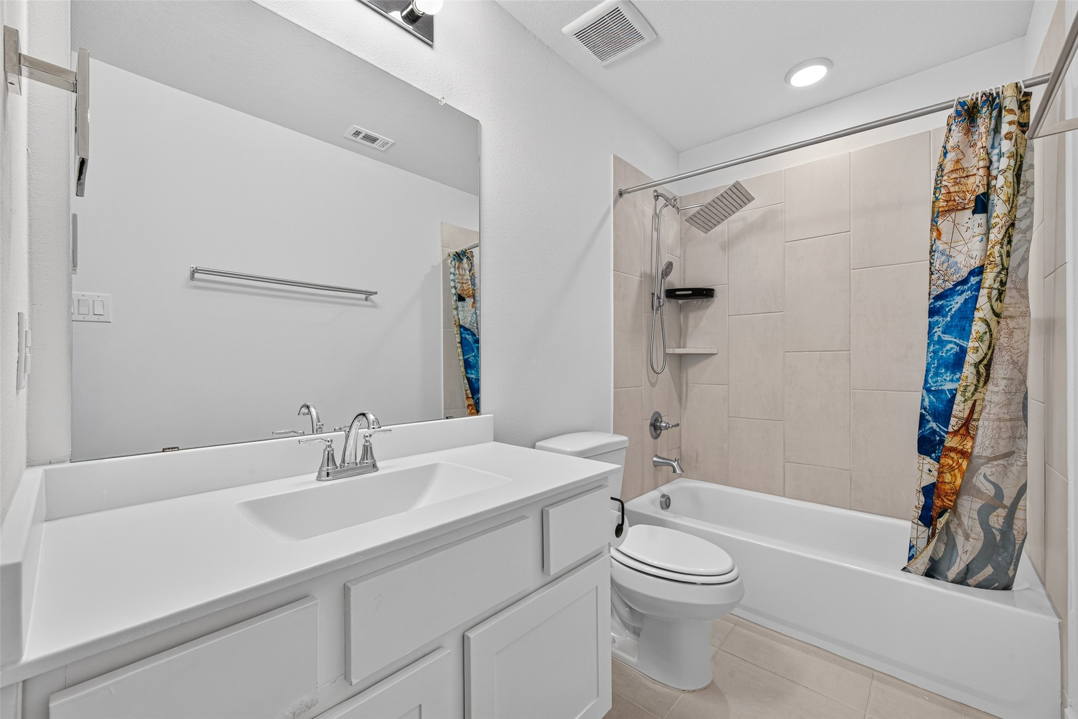 Secondary bedroom #3s en-suite bathroom offers a private, well-appointed space that combines everyday convenience with a polished, contemporary fee