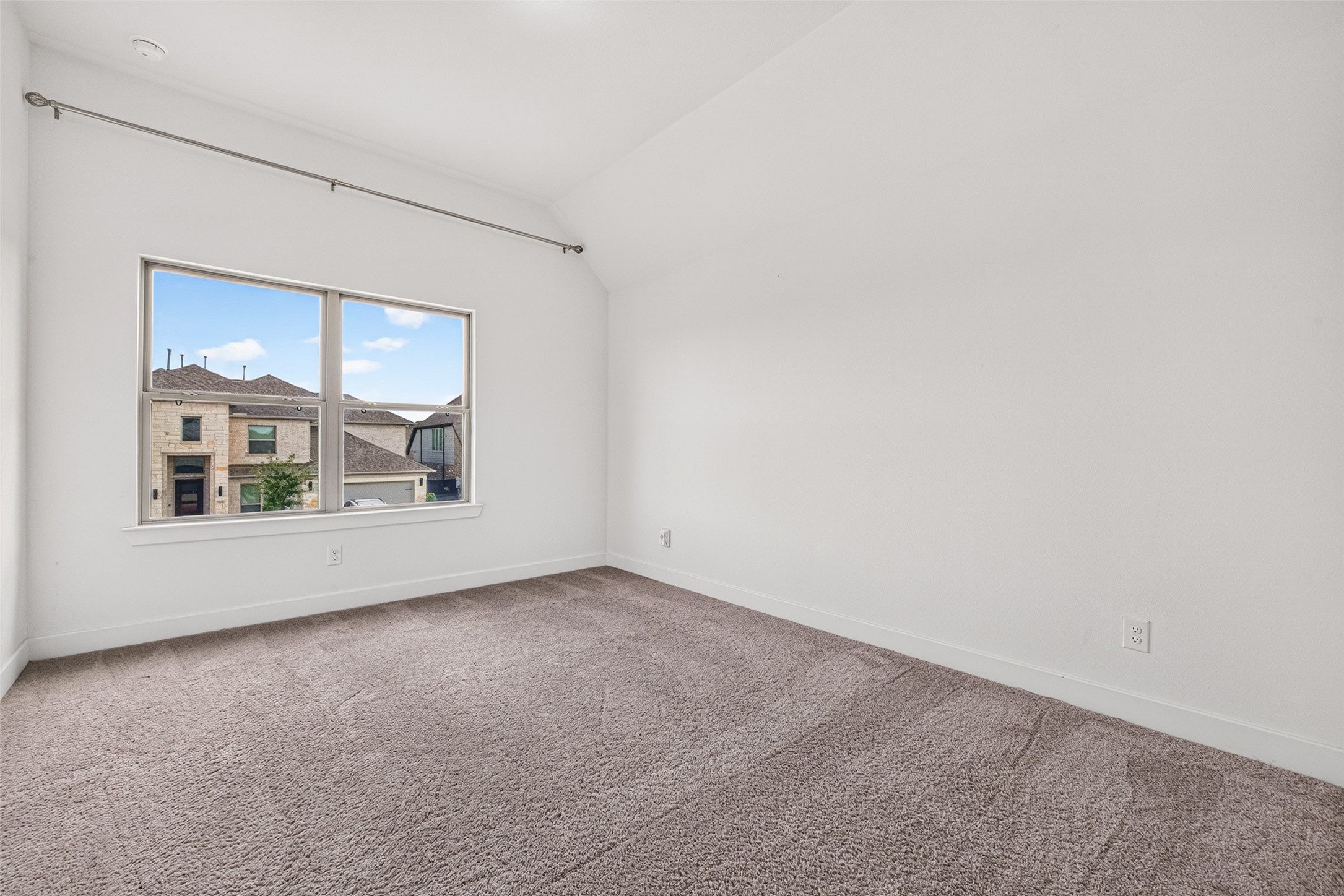 The second-floor secondary bedroom #3 offers a private, well-appointed retreat, complete with its own en-suite bath for a seamless blend of comfort, independence, and everyday convenience