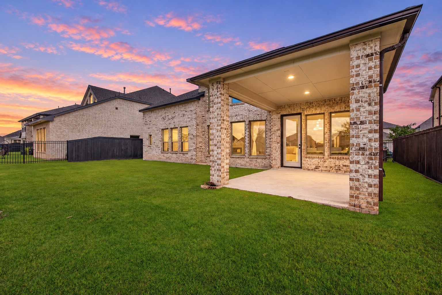 Enjoy the expansive backyard and covered patio, an inviting outdoor retreat perfect for peaceful relaxation, elegant entertaining, and creating cherished memories with family and friends