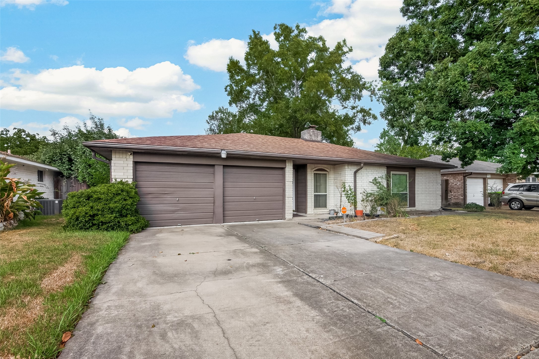 Spacious driveway and two car garage Spacious driveway and two car garage