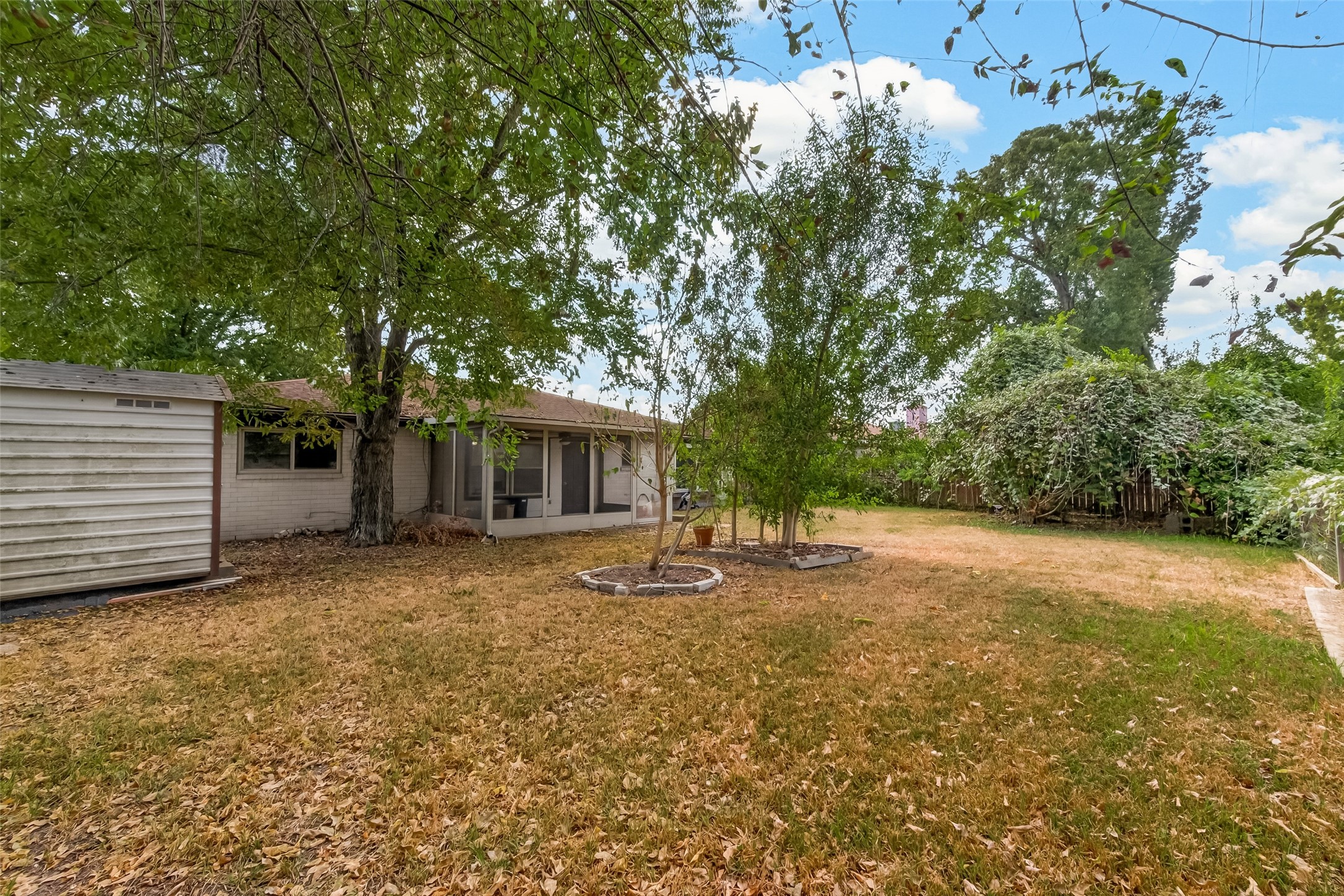 Spacious backyard and shed stays.