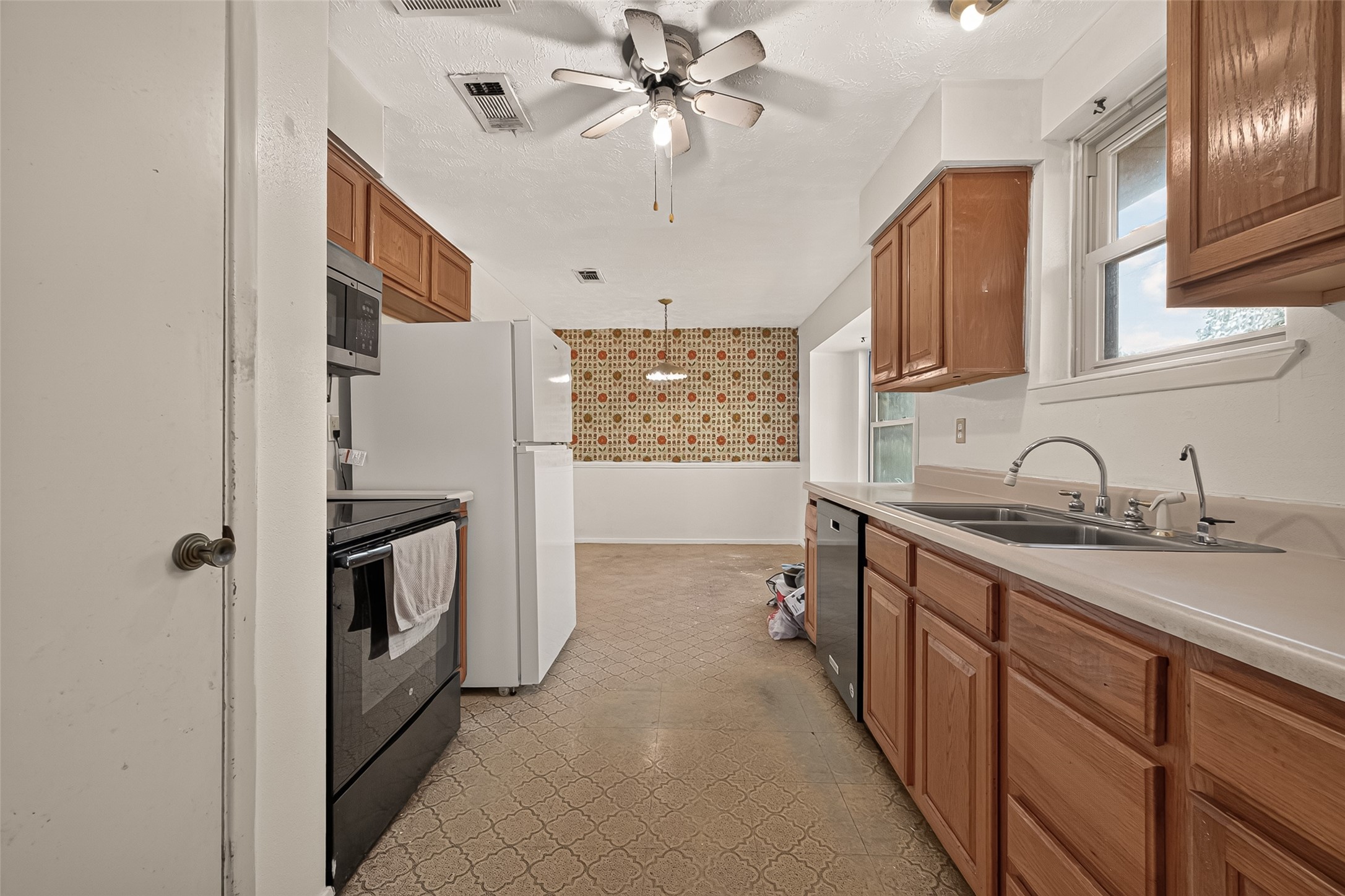 Your galley kitchen and breakfast area.