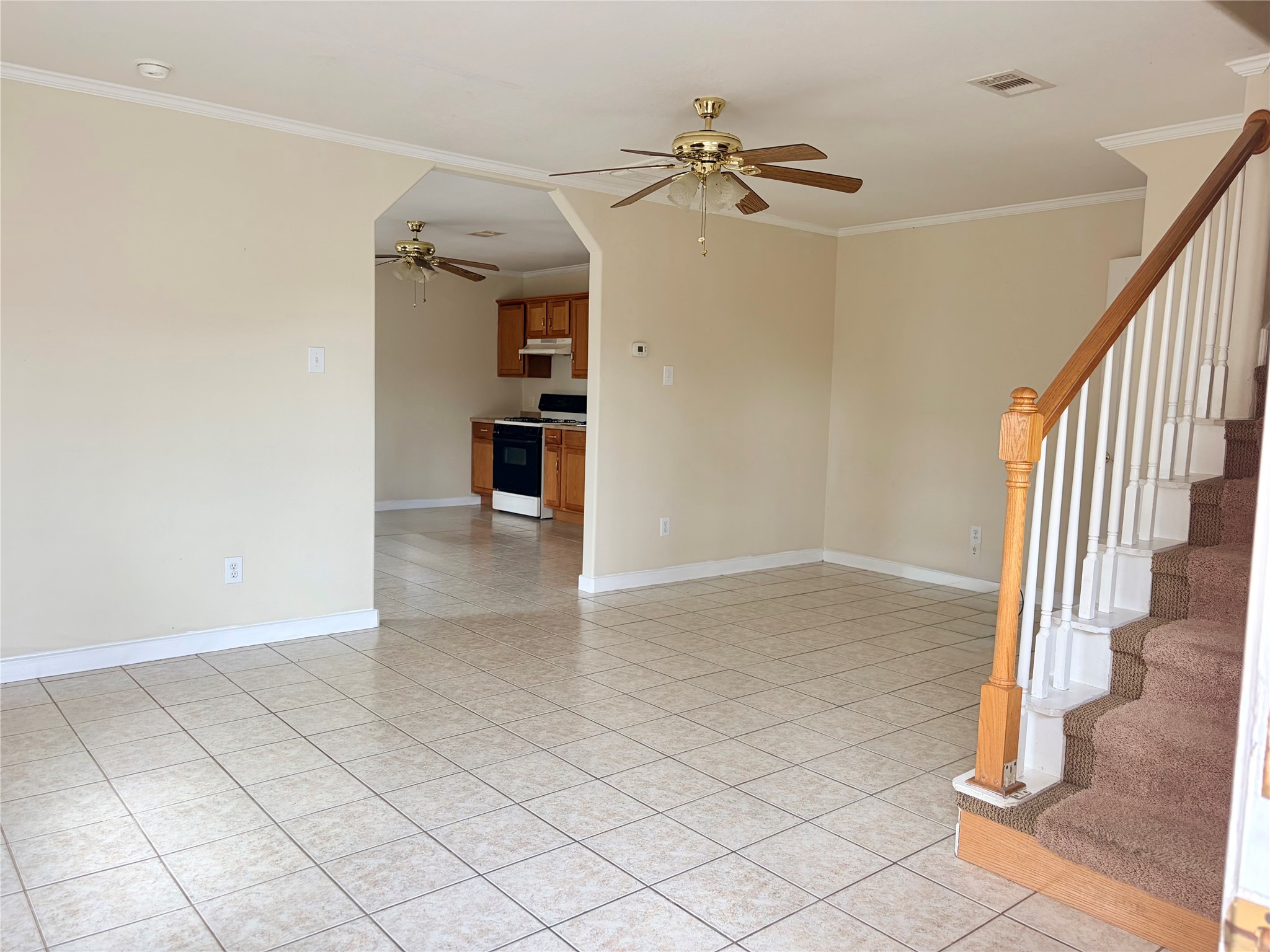 Enter your living room with access to half bath downstairs for guests