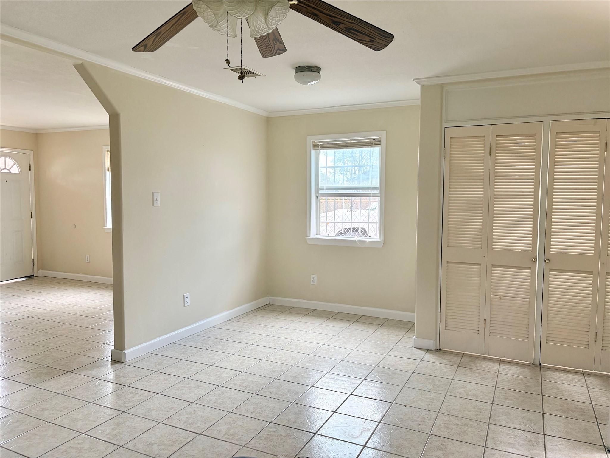 Natural light shines through breakfast area which also includes a washer/dryer connections behind closed doors