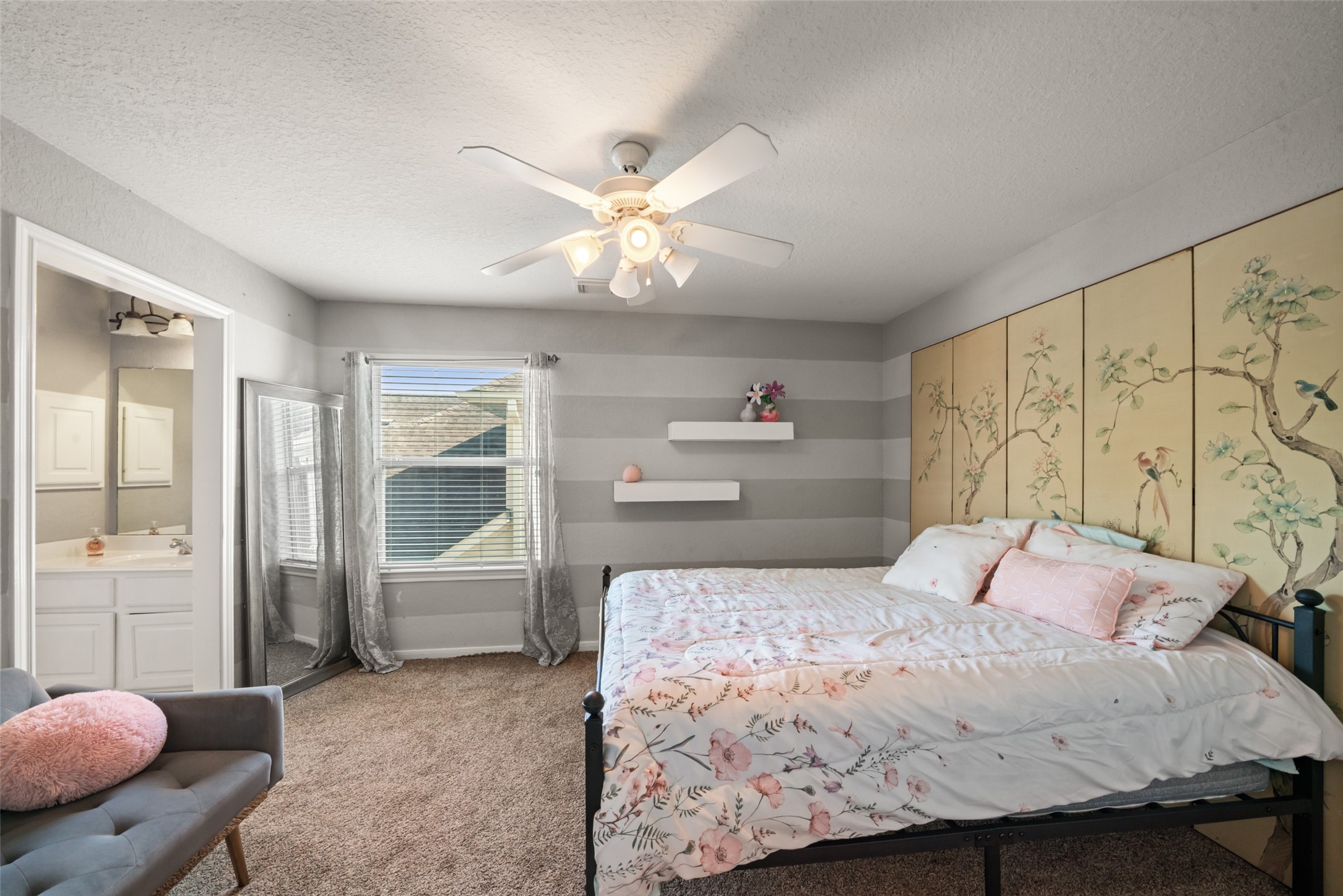A comfortable bedroom that is ready for your own personal touch.