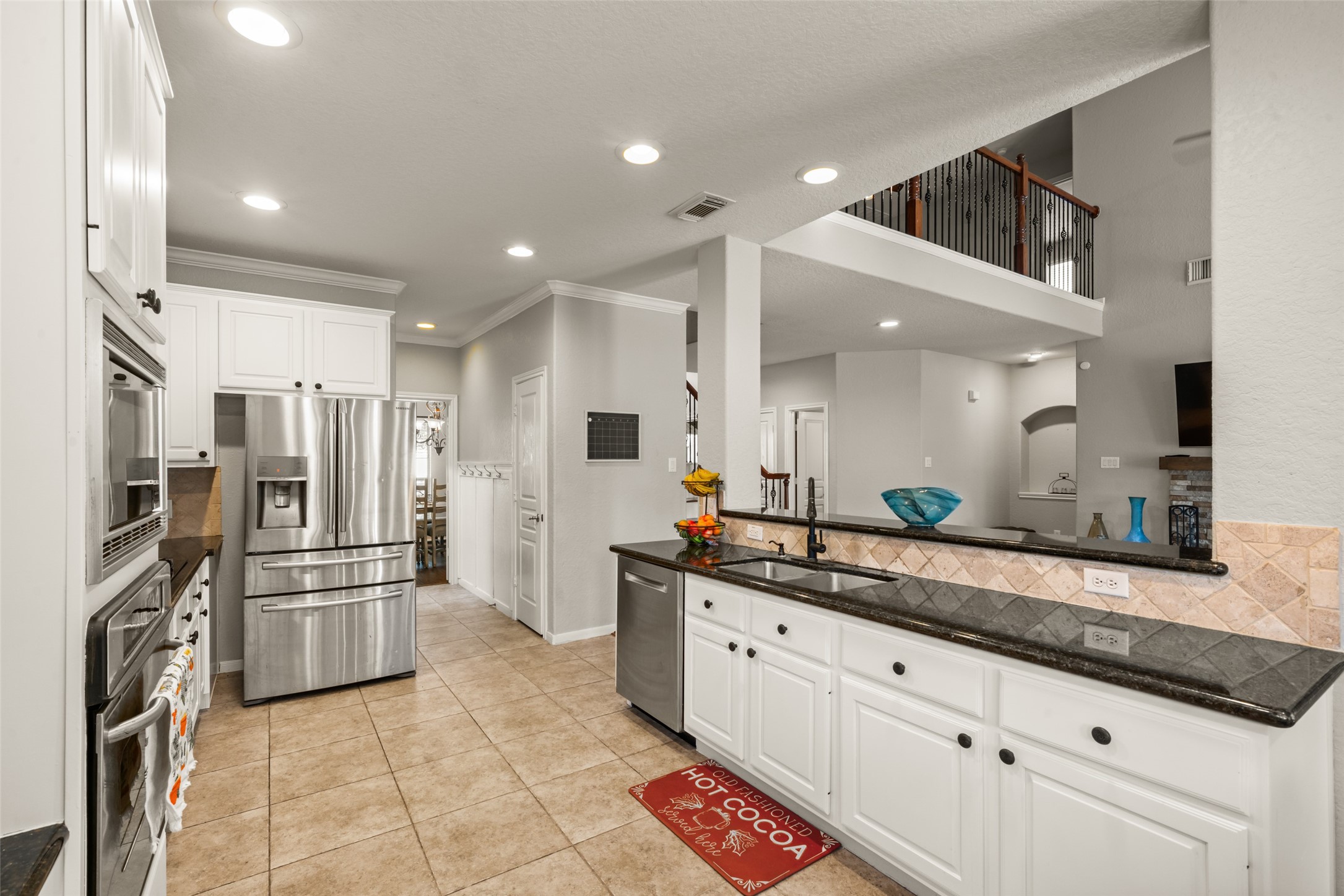 The kitchen conveniently opens up to the living area.