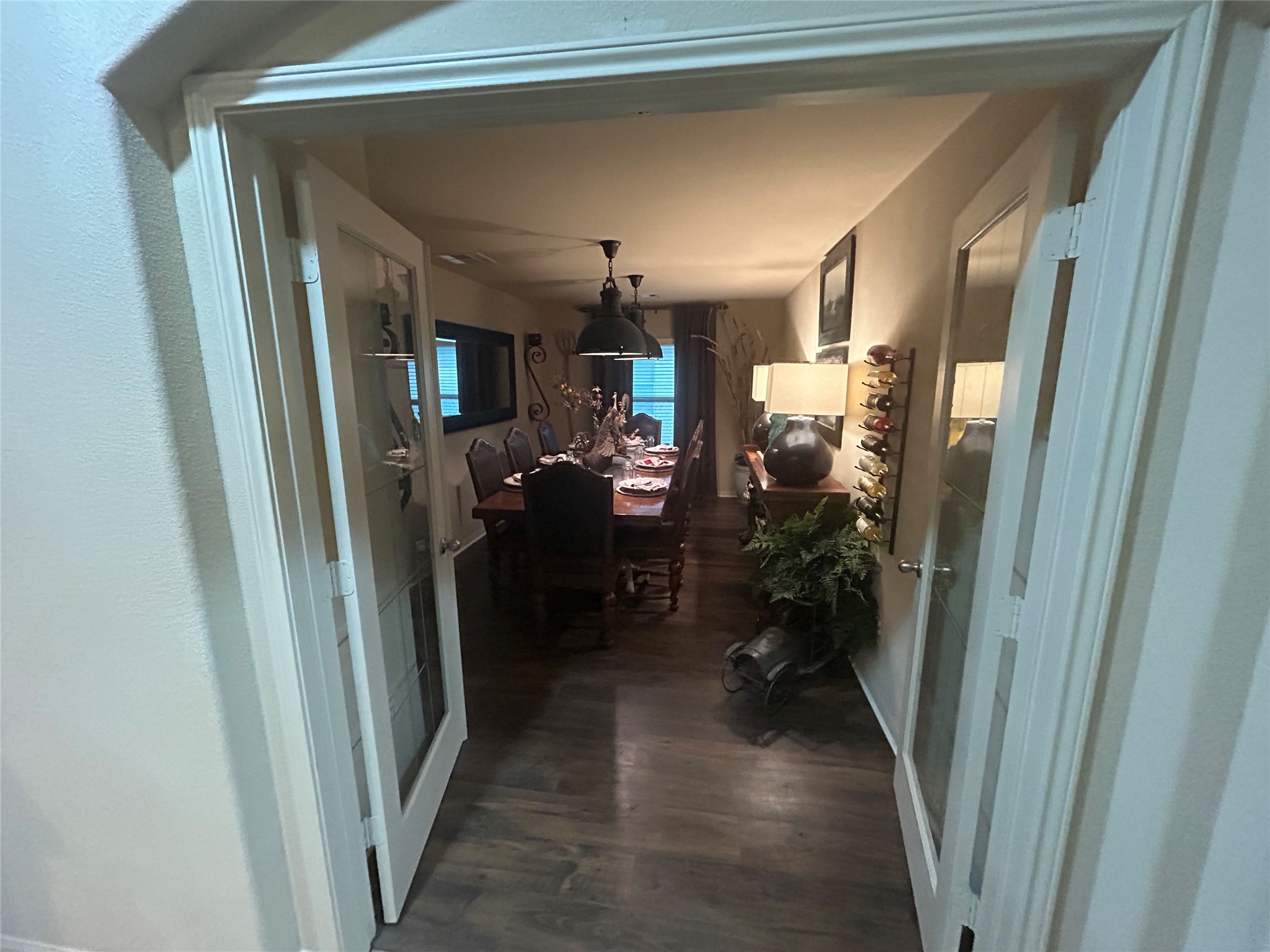 French doors leads to Dining Room.