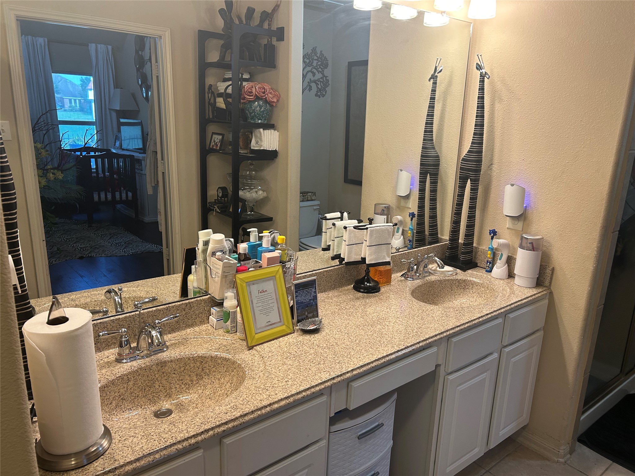 Secondary Bathroom with double sink basins