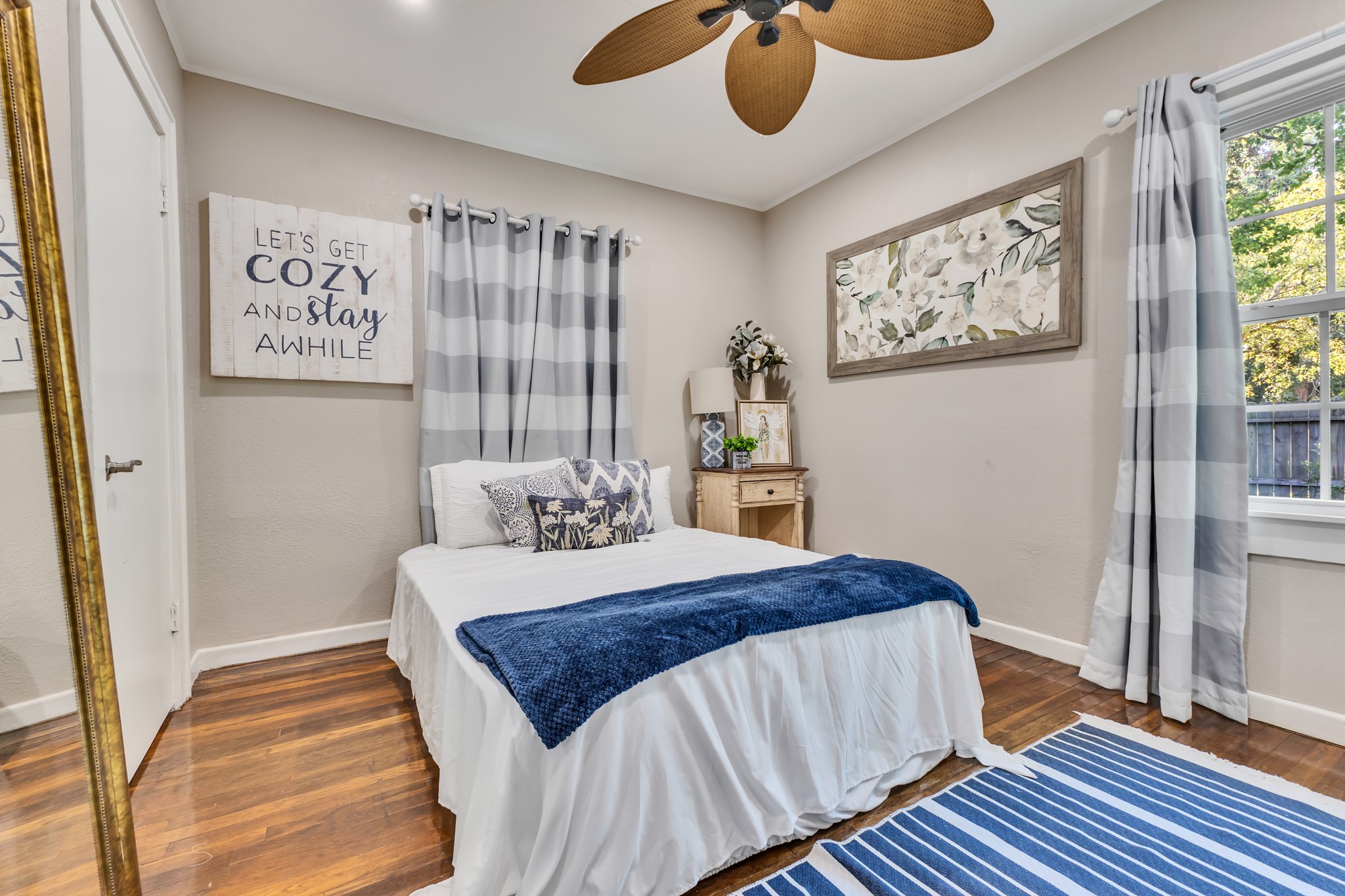 Having an additional bedroom means having more options! With natural light, wood flooring, and a ceiling fan, this comfortable space can serve as a guest room, home office, or personal creative space.