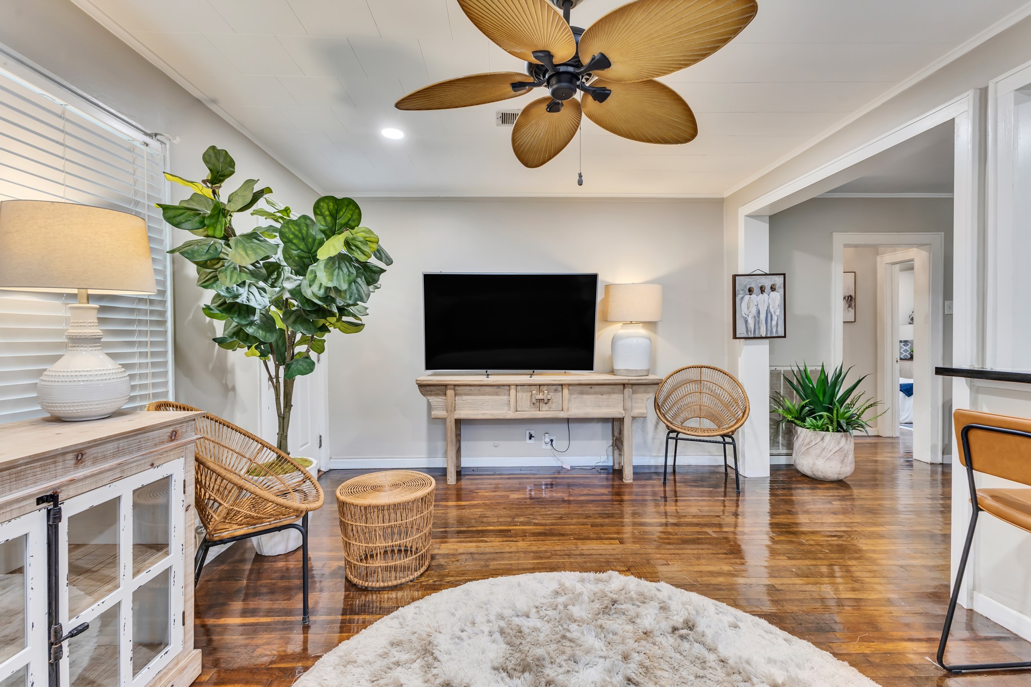 A versatile living area with plenty of possibilities! Whether you're creating a cozy movie-night setting or a comfortable place to entertain, this room offers the flexibility to make it your own.