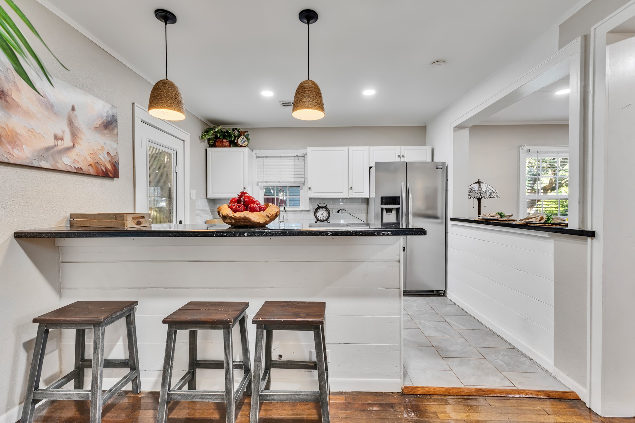 Small details can make a big difference in everyday living! This breakfast bar adds casual dining space and a natural gathering spot, giving the kitchen extra functionality while maintaining an open feel.