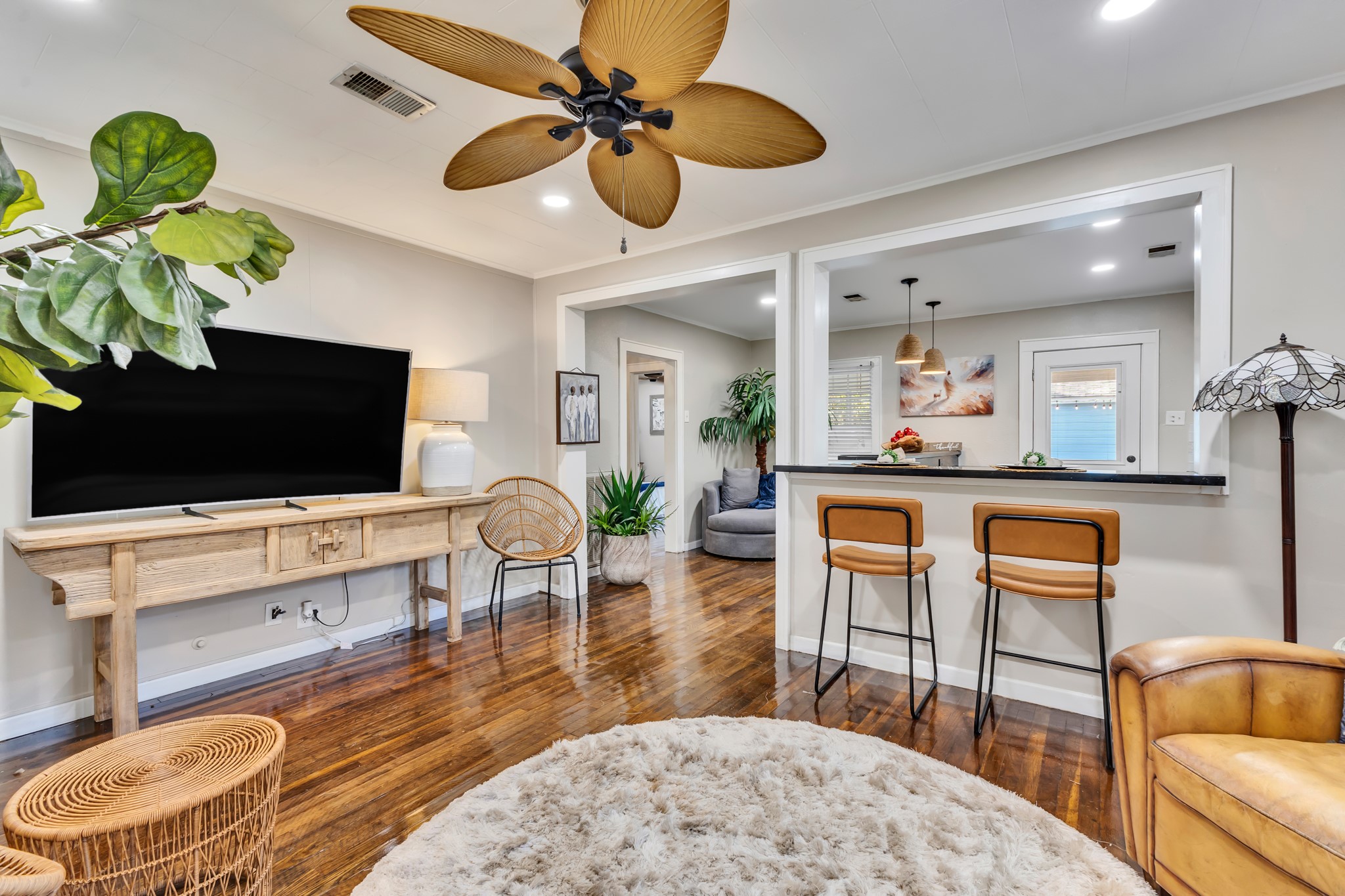 An easy flow between the kitchen and living room makes this home feel connected and welcoming. Enjoy the convenience of entertaining guests while keeping conversations going from either space.