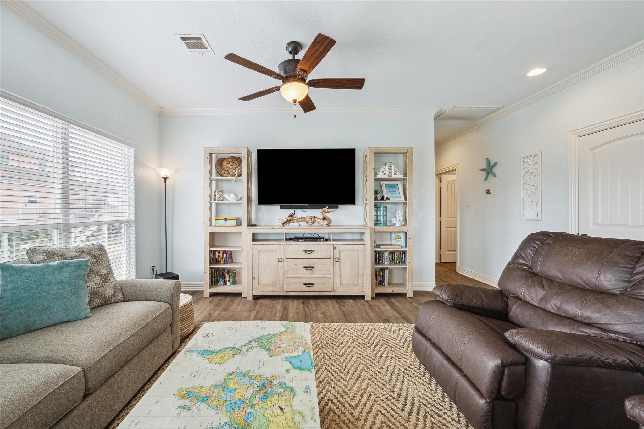All beach decor conveys with the sale of the home. Brand NEW 65" smart TV in the living room - also new smart TV's in all other bedrooms.