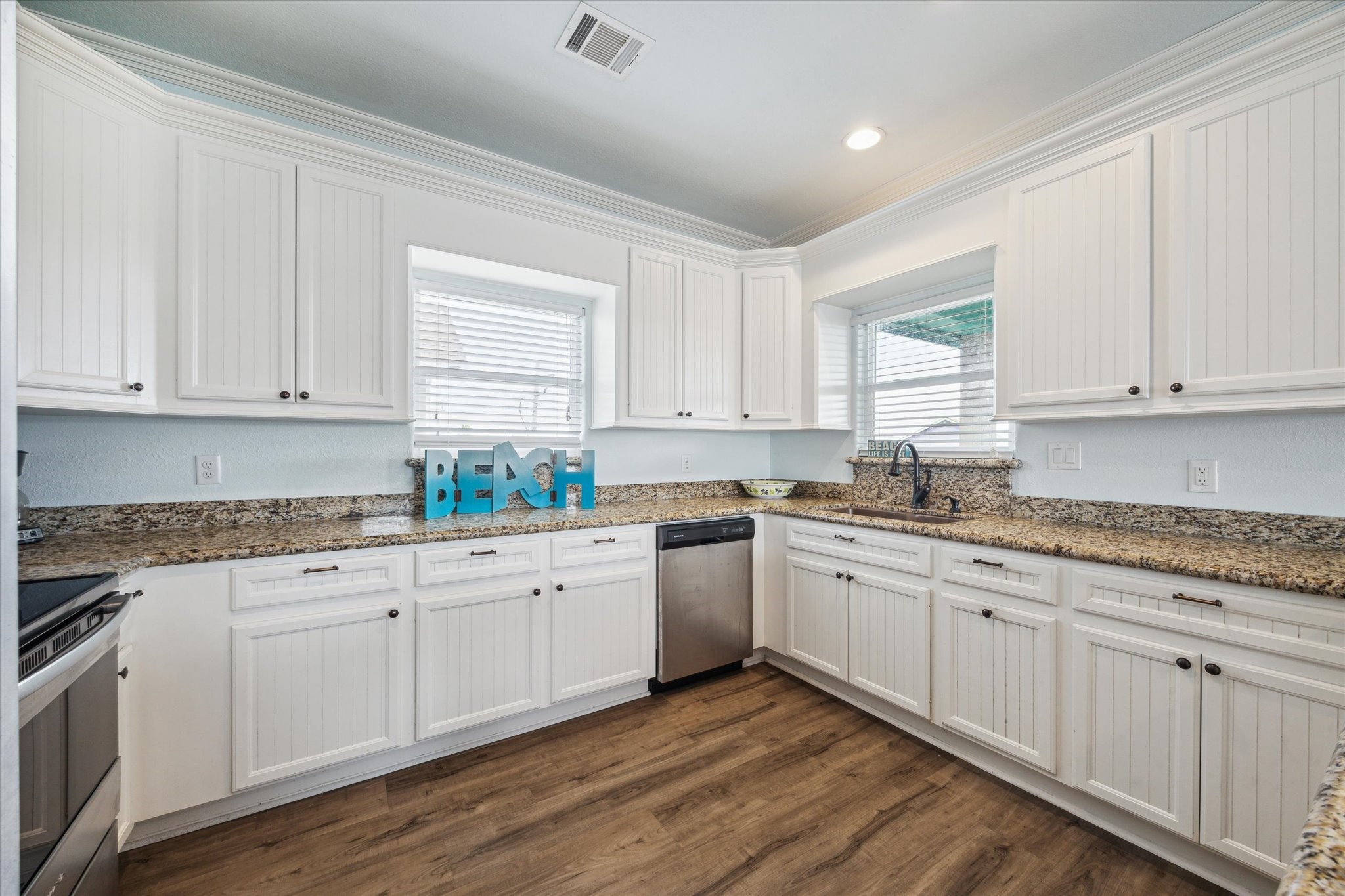 TONS of cabinetry and counter space. Lots of kitchen appliances will convey with the sale.