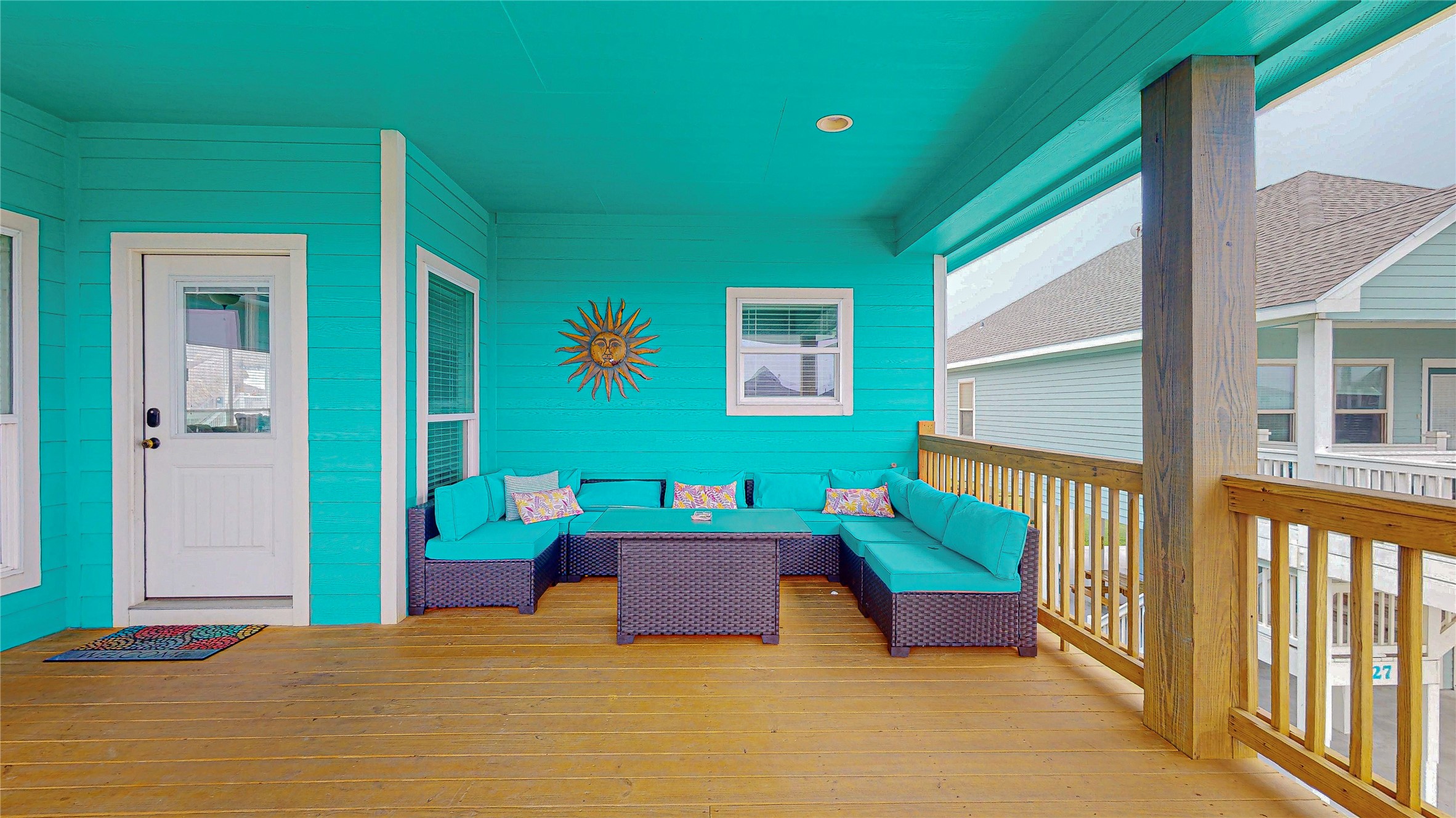 This vibrant costal furniture comes with the sale of the home.