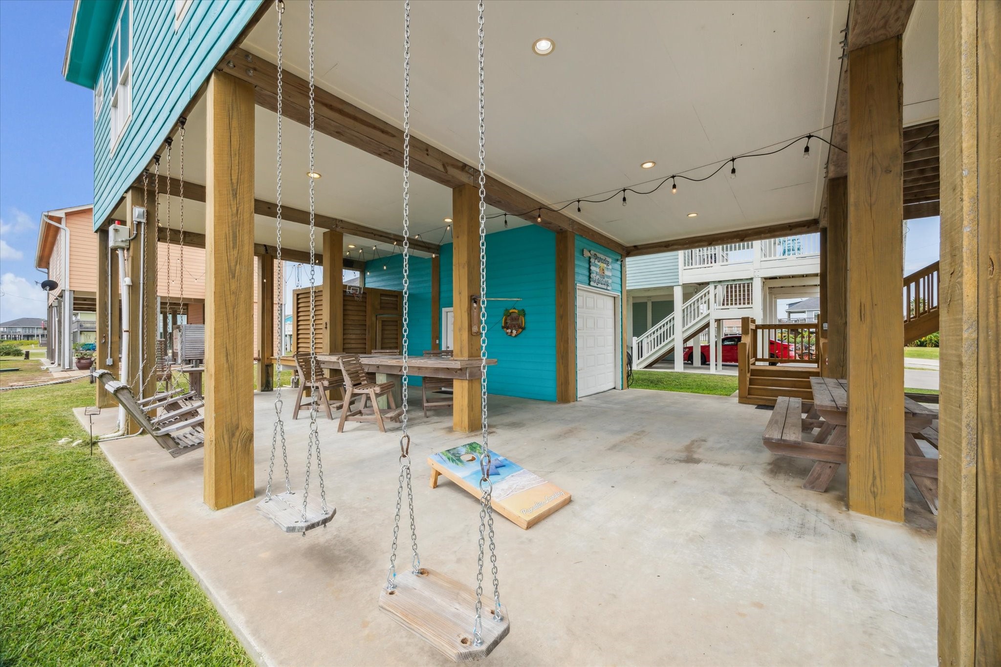 Plenty of space for outdoor entertaining, complete with swings where you can relax and enjoy the soothing sounds of the surf. Plenty of space for outdoor entertaining, complete with swings where you can relax and enjoy the soothing sounds of the surf.