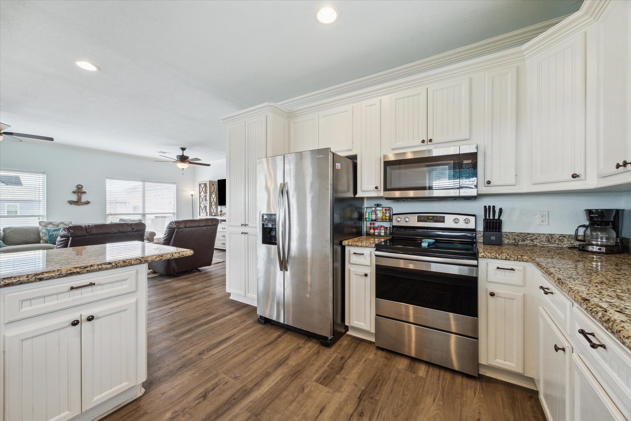 NEW $1500 Frigidaire refrigerator now at property. Spacious kitchen featuring stainless steel appliances, all the essential kitchenware, and granite countertops.