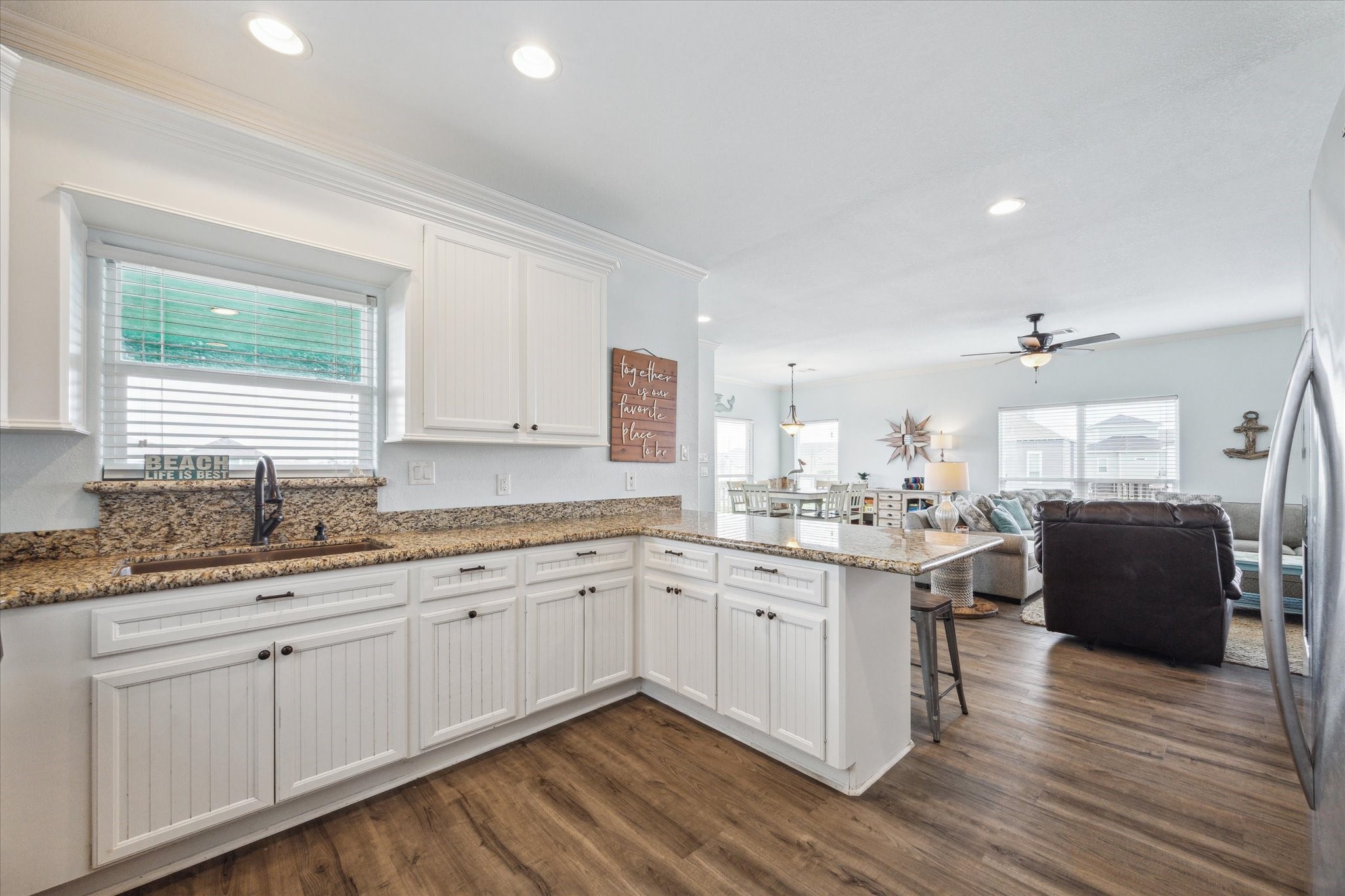 Enjoy a lovely view from your kitchen sink, overlooking the expansive outdoor space.