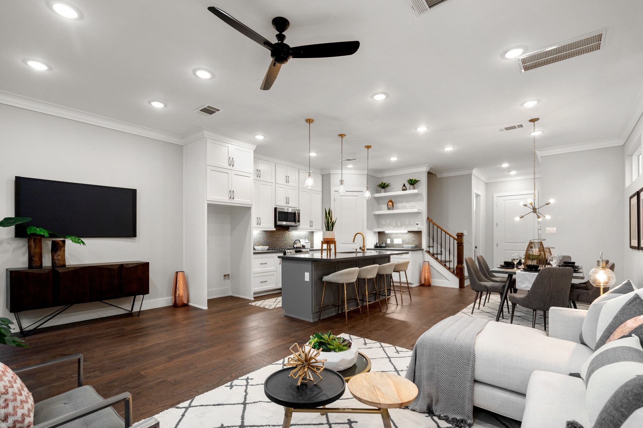 Whether you're curling up with a book or hosting a movie night with friends, this inviting space is perfect for relaxation and entertainment alike. Photos are of previous model home.