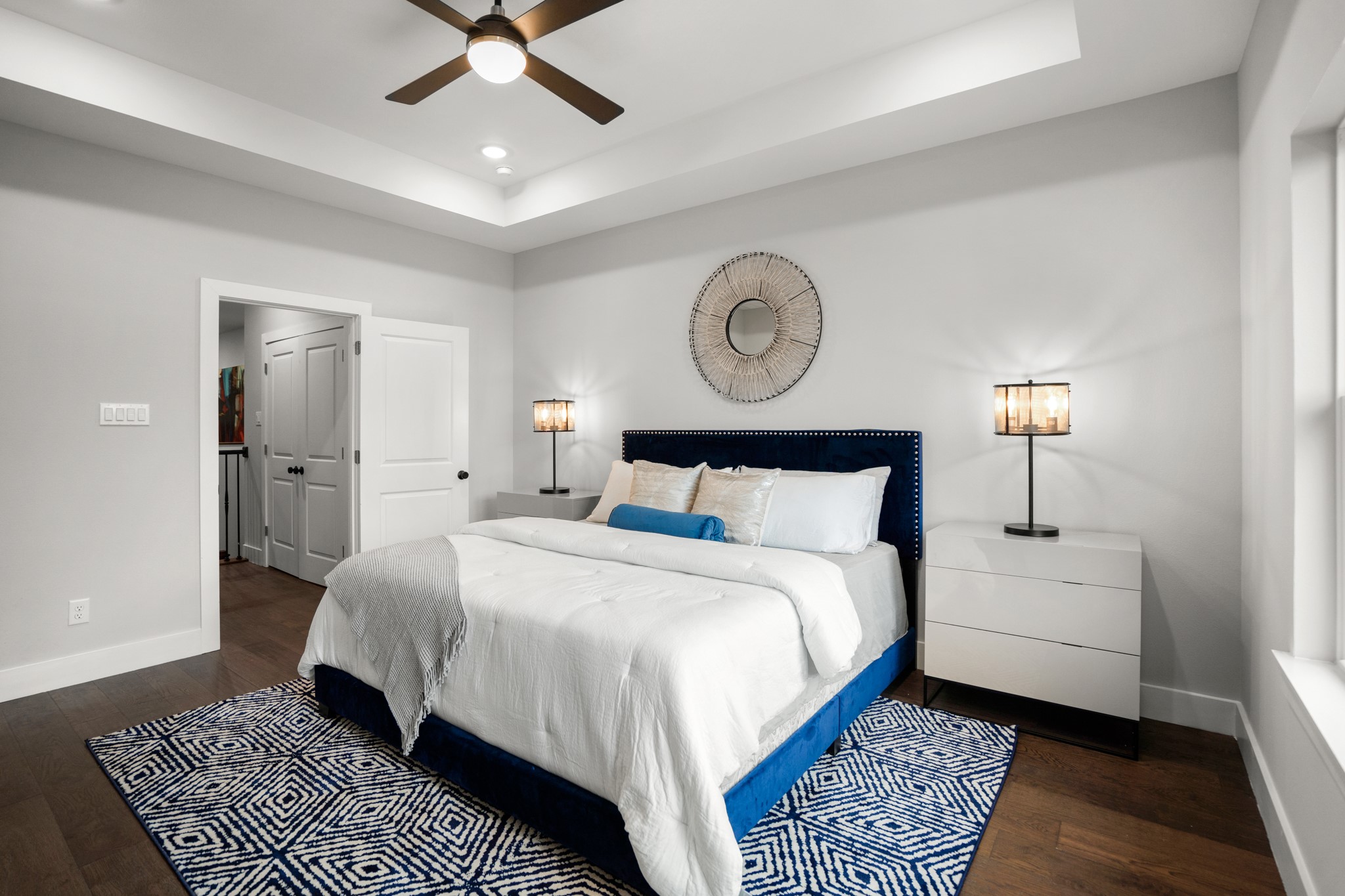 Upstairs, the master bedroom awaits, featuring an accent tray ceiling that adds a touch of luxury. Photos are of previous model home.