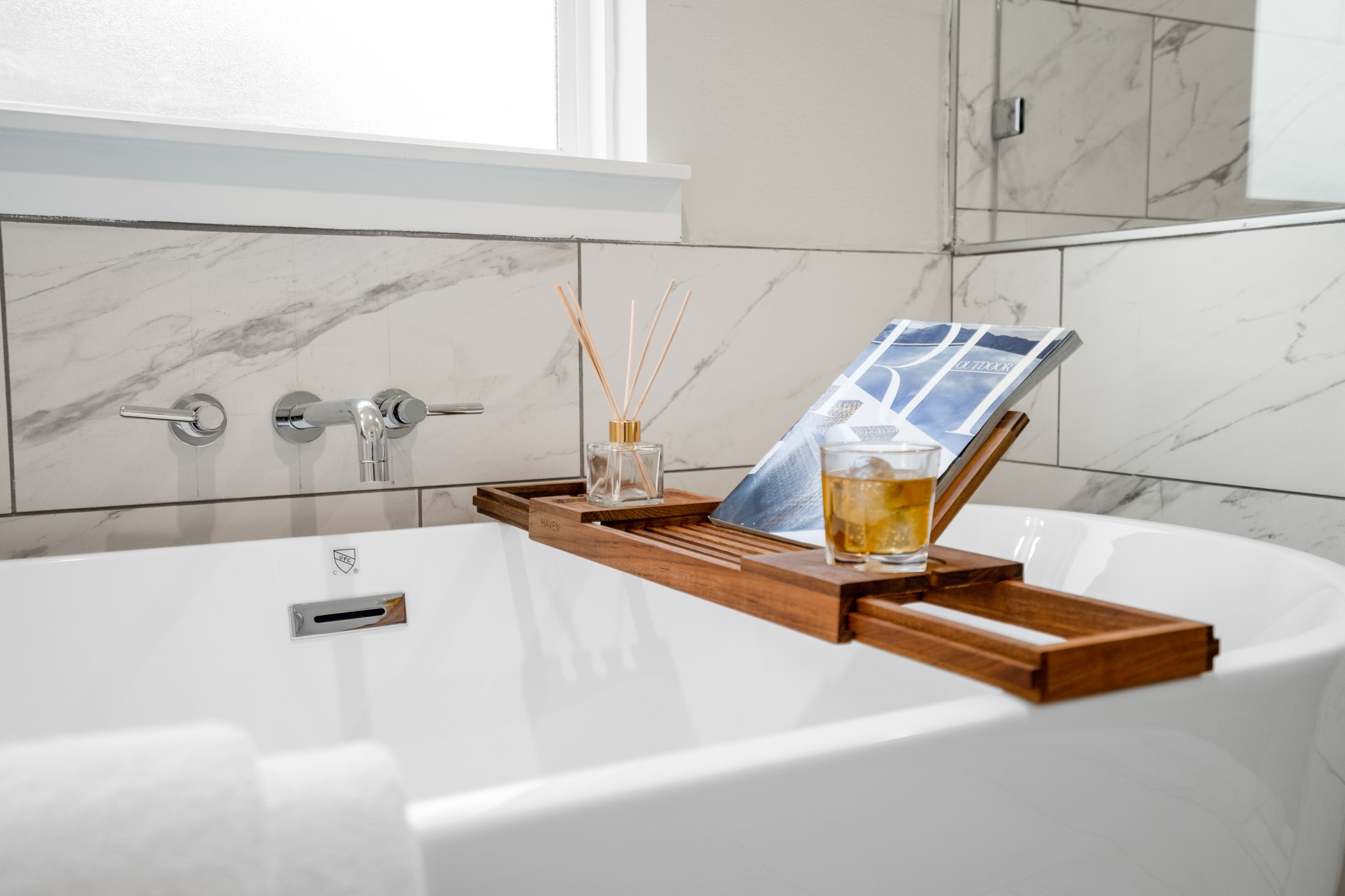 The bath tub is a symbol of luxury and relaxation, inviting you to unwind and indulge in a blissful soak after a long day. Photos are of previous model home.