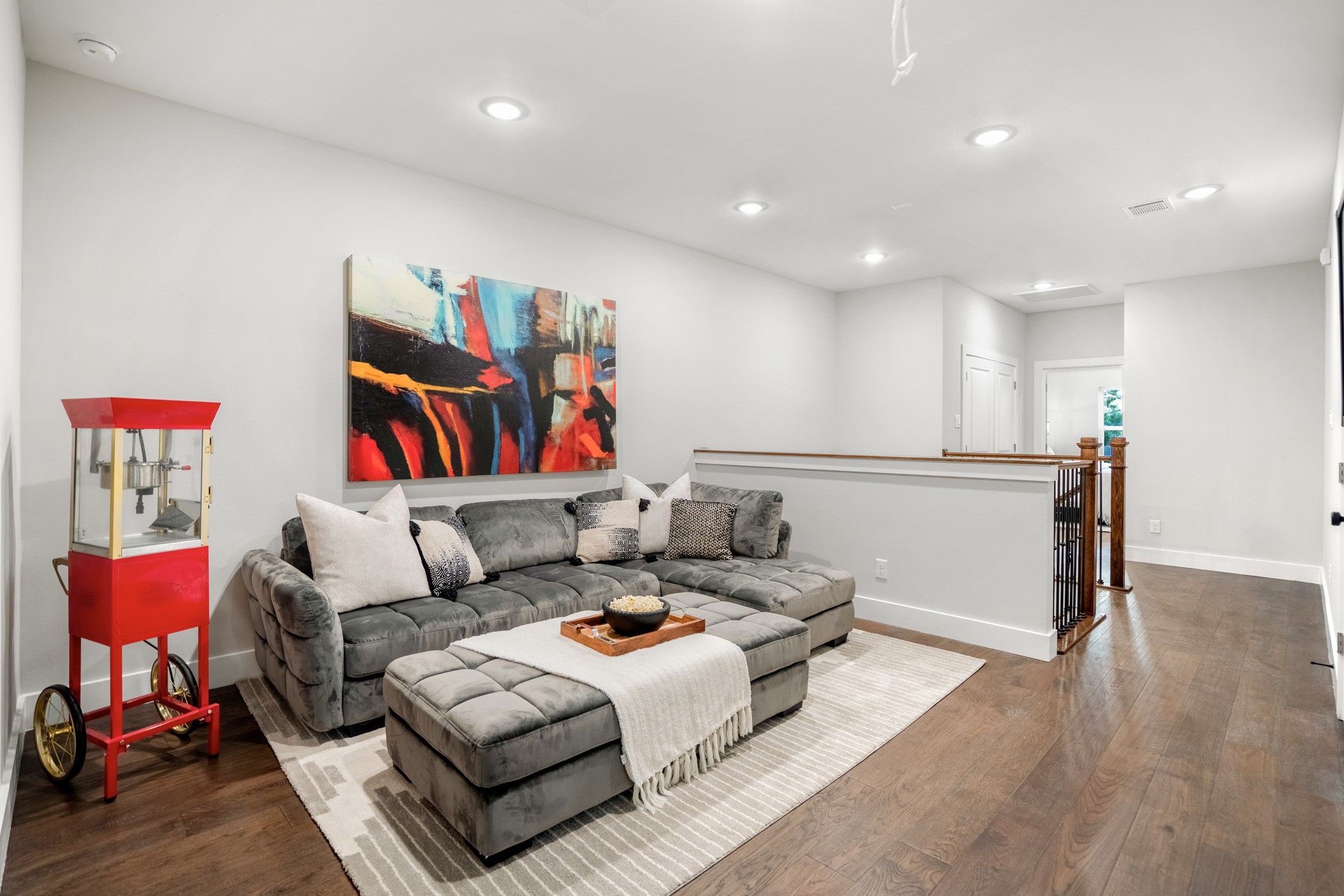 With its adaptable layout and comfortable furnishings, this multifunctional space can easily be customized to suit your lifestyle, whether you're hosting guests, enjoying family movie nights, or simply seeking a quiet place to unwind. Photos are of previous model home.