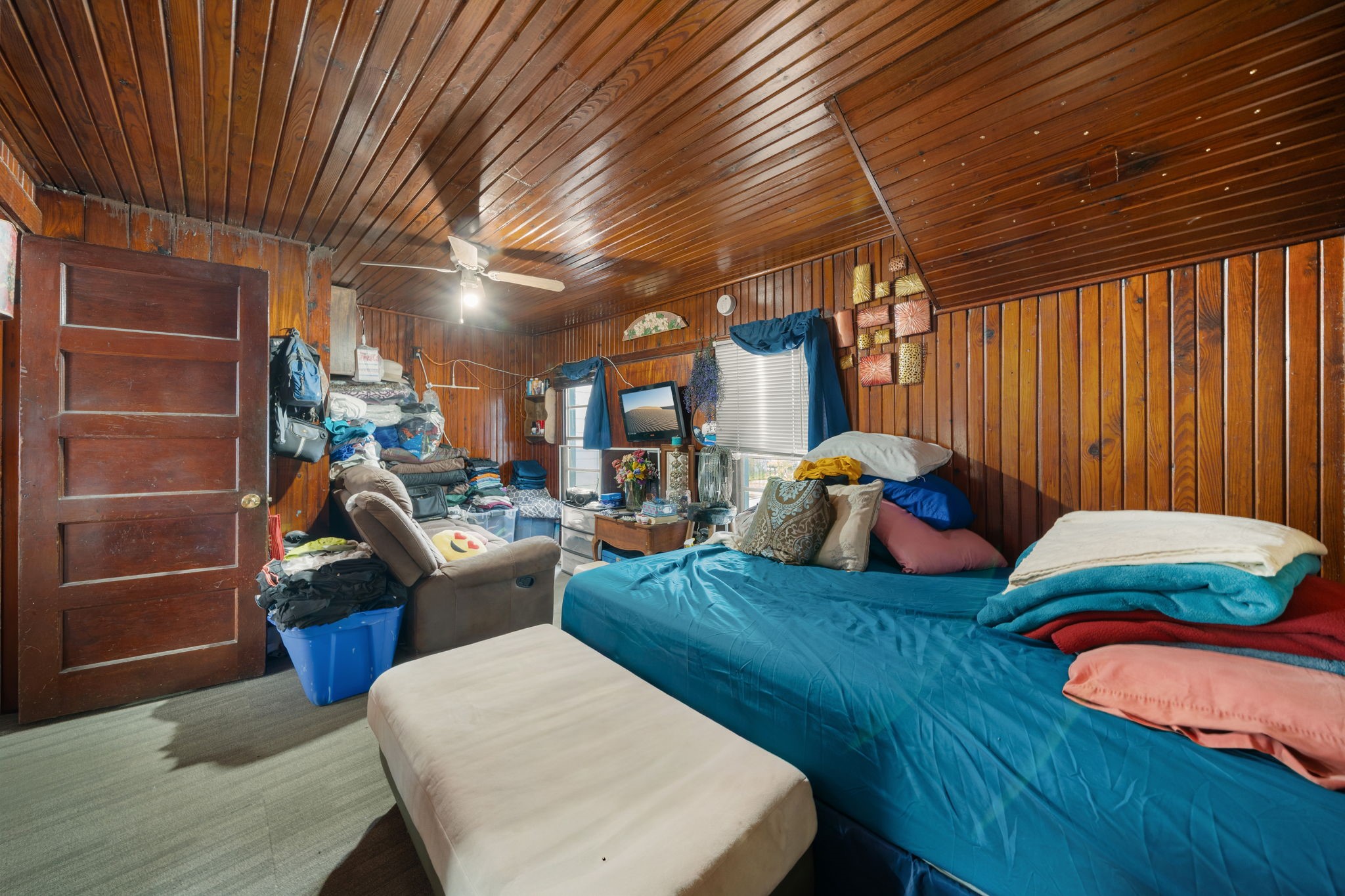 Full bedroom and living area.