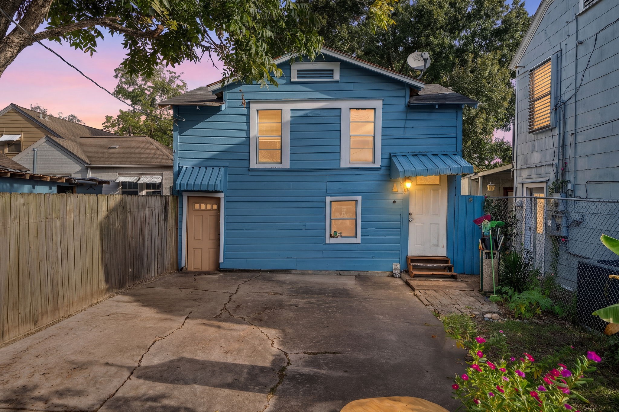 Second home located in the back that has it's own driveway and it is gated.